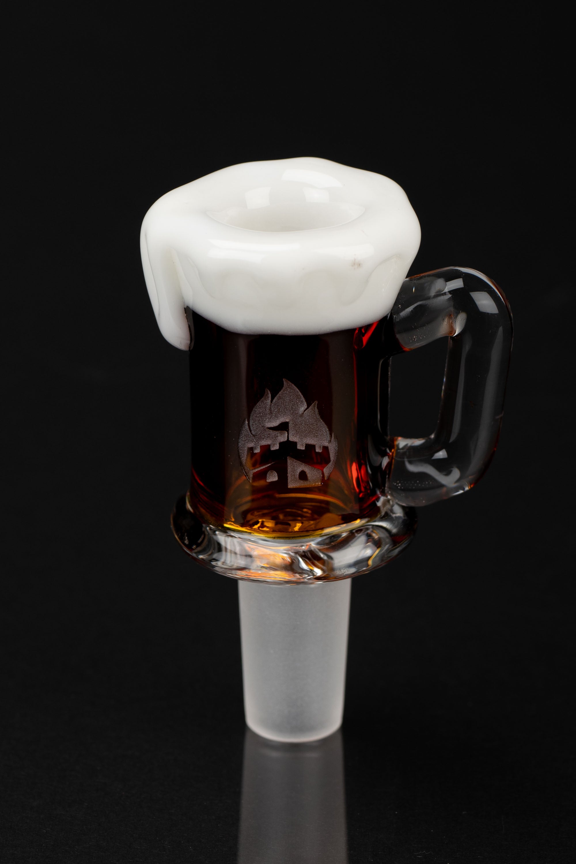 Glass bong bowl shaped like a beer mug with foamy white rim.