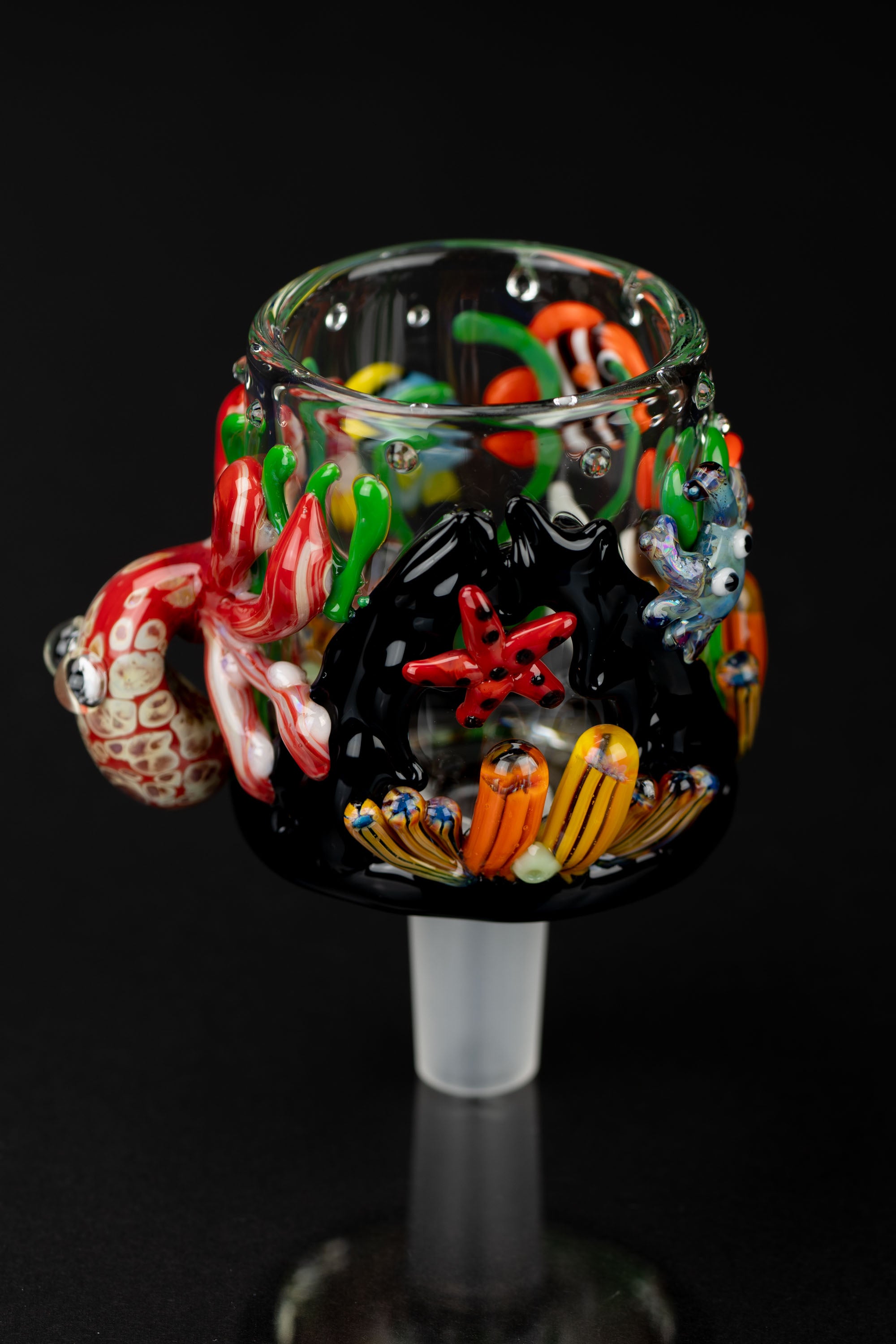 Hand-blown glass cannabis bowl featuring colorful sculpted sea creatures.