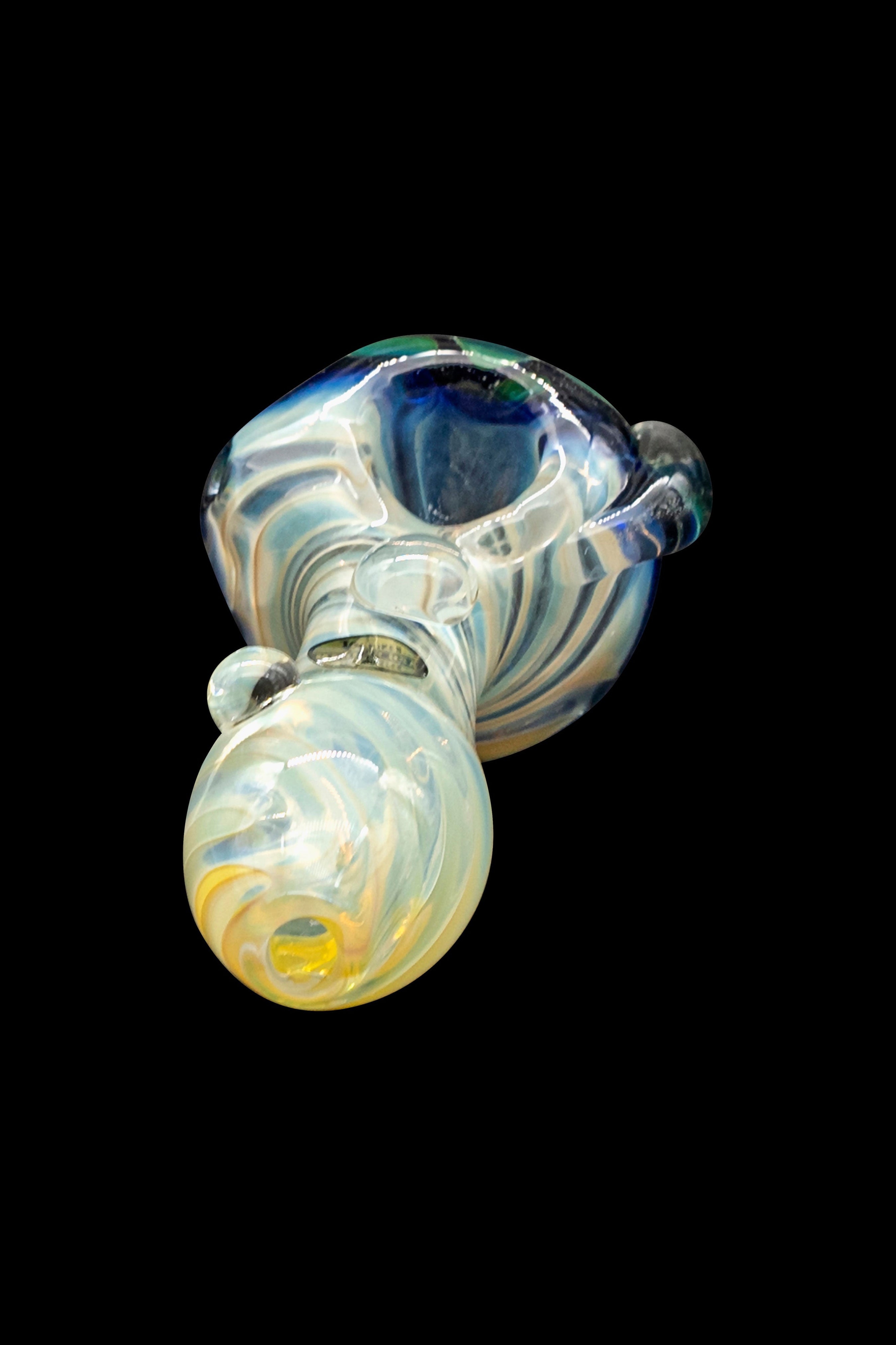 Hand-blown glass pipe with swirling blue, white, and yellow patterns.