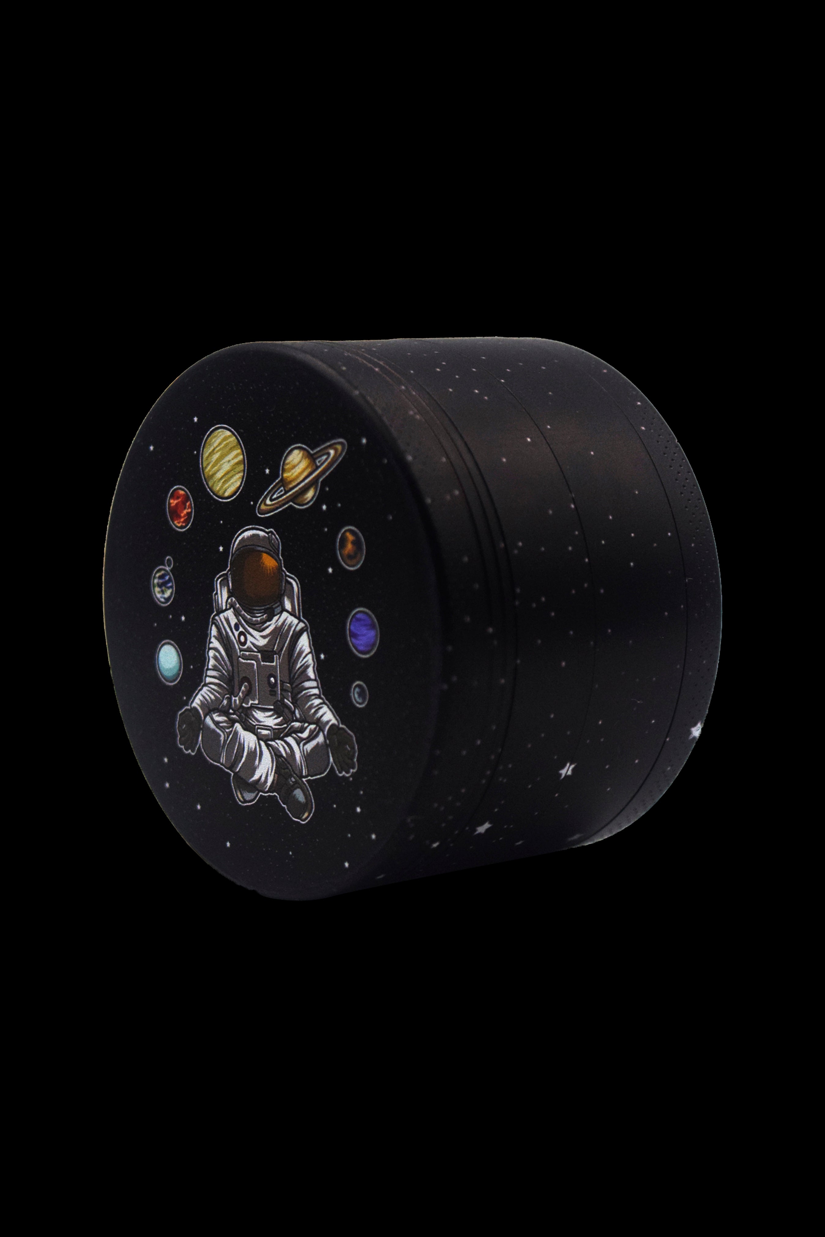 Black cannabis storage container with an illustration of a meditating astronaut surrounded by planets.