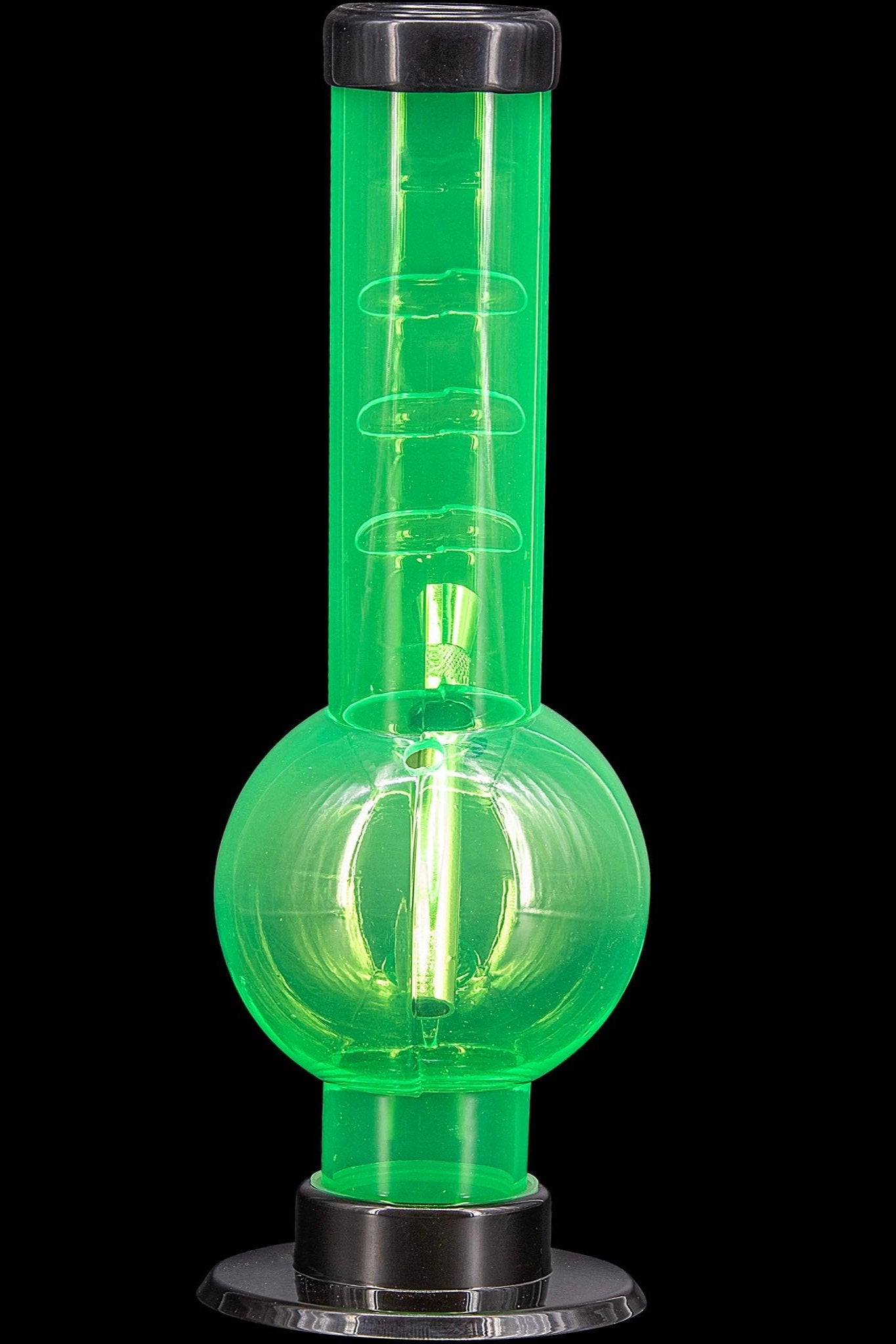 Glowing green glass water pipe (bong) on a black base.