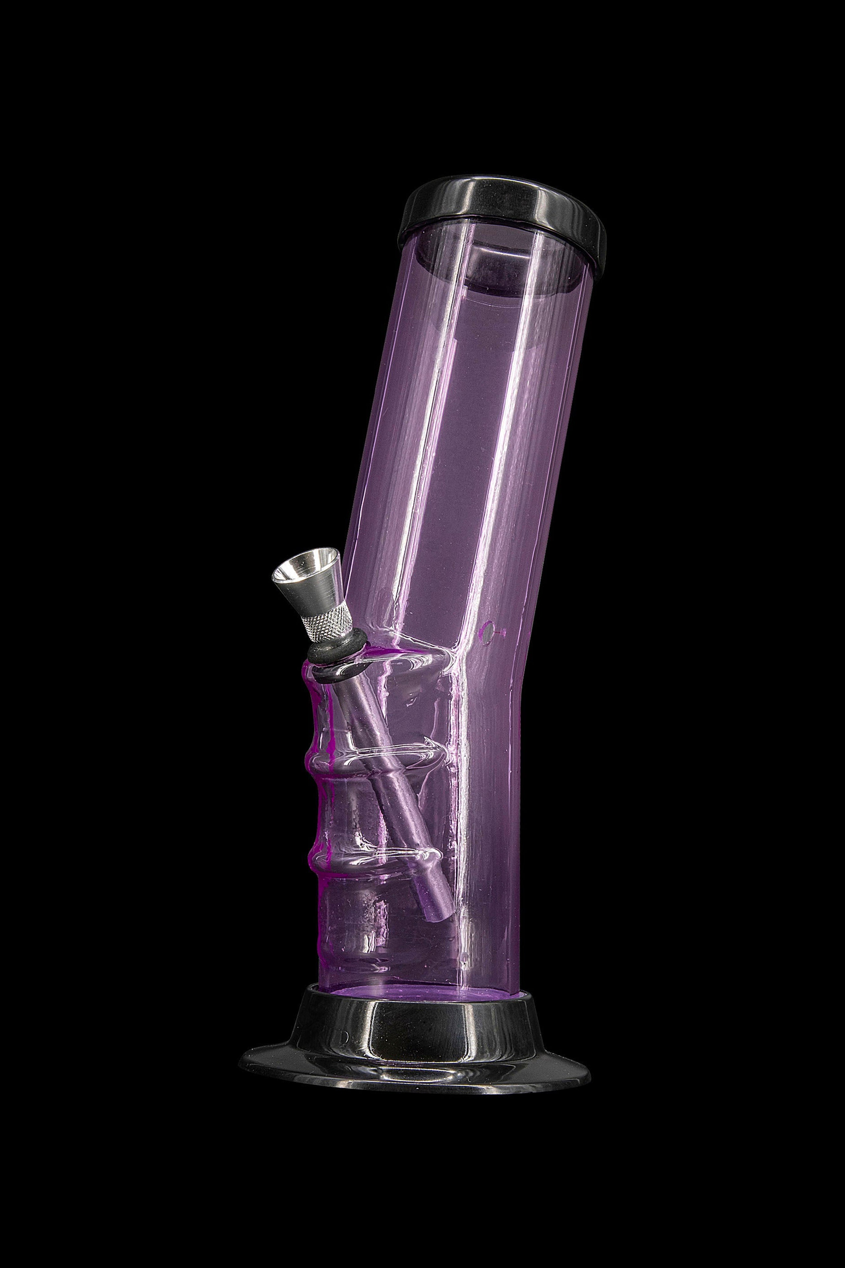 Purple glass bong against a black background.