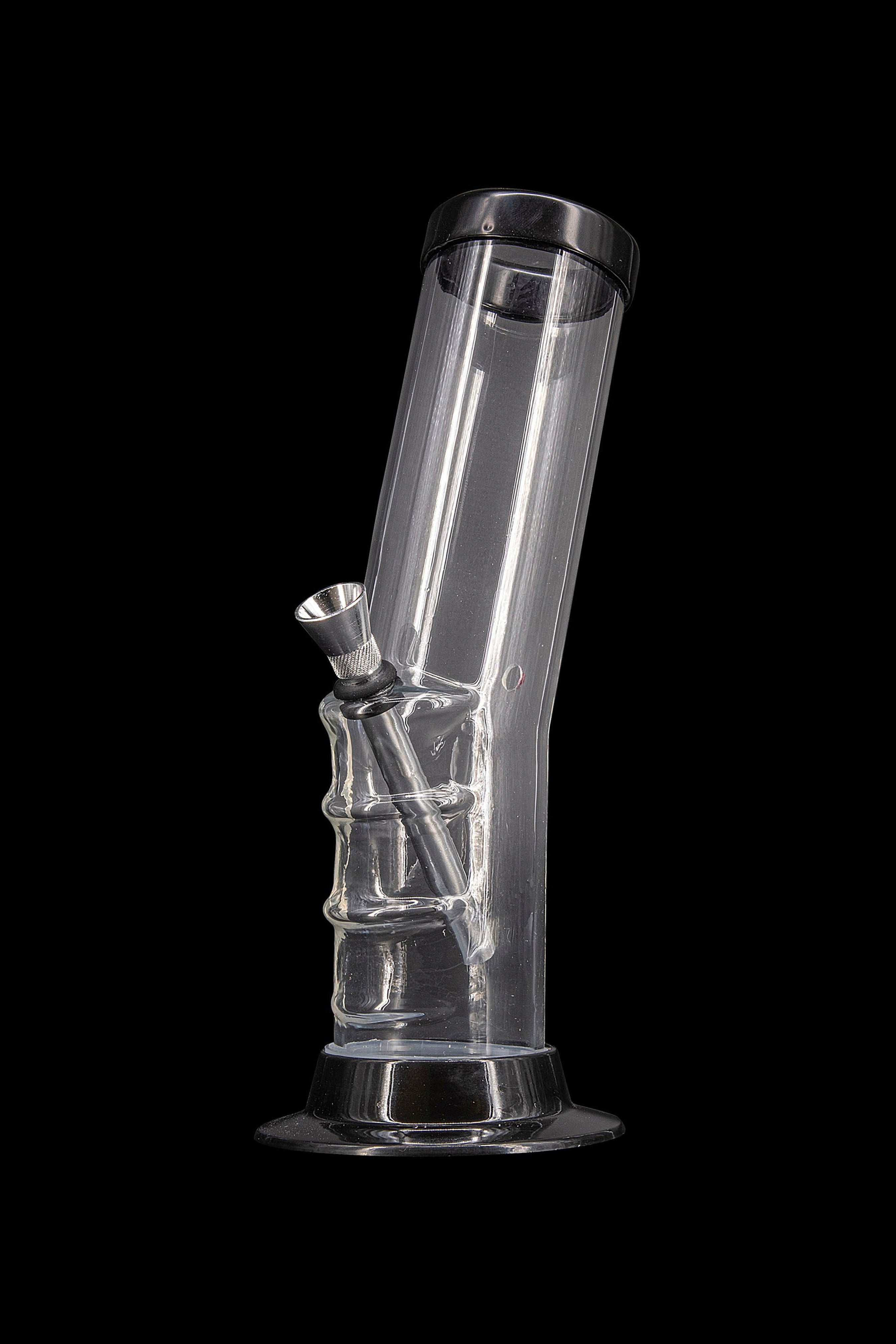 Clear glass bong isolated on a black background.