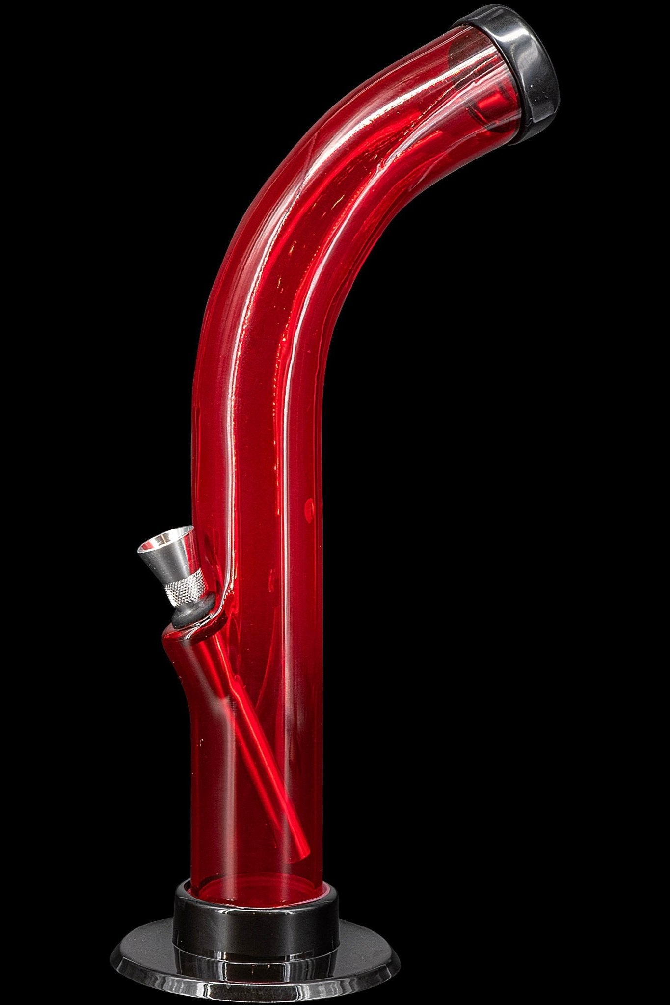 Red glass water pipe with a black base, studio shot.