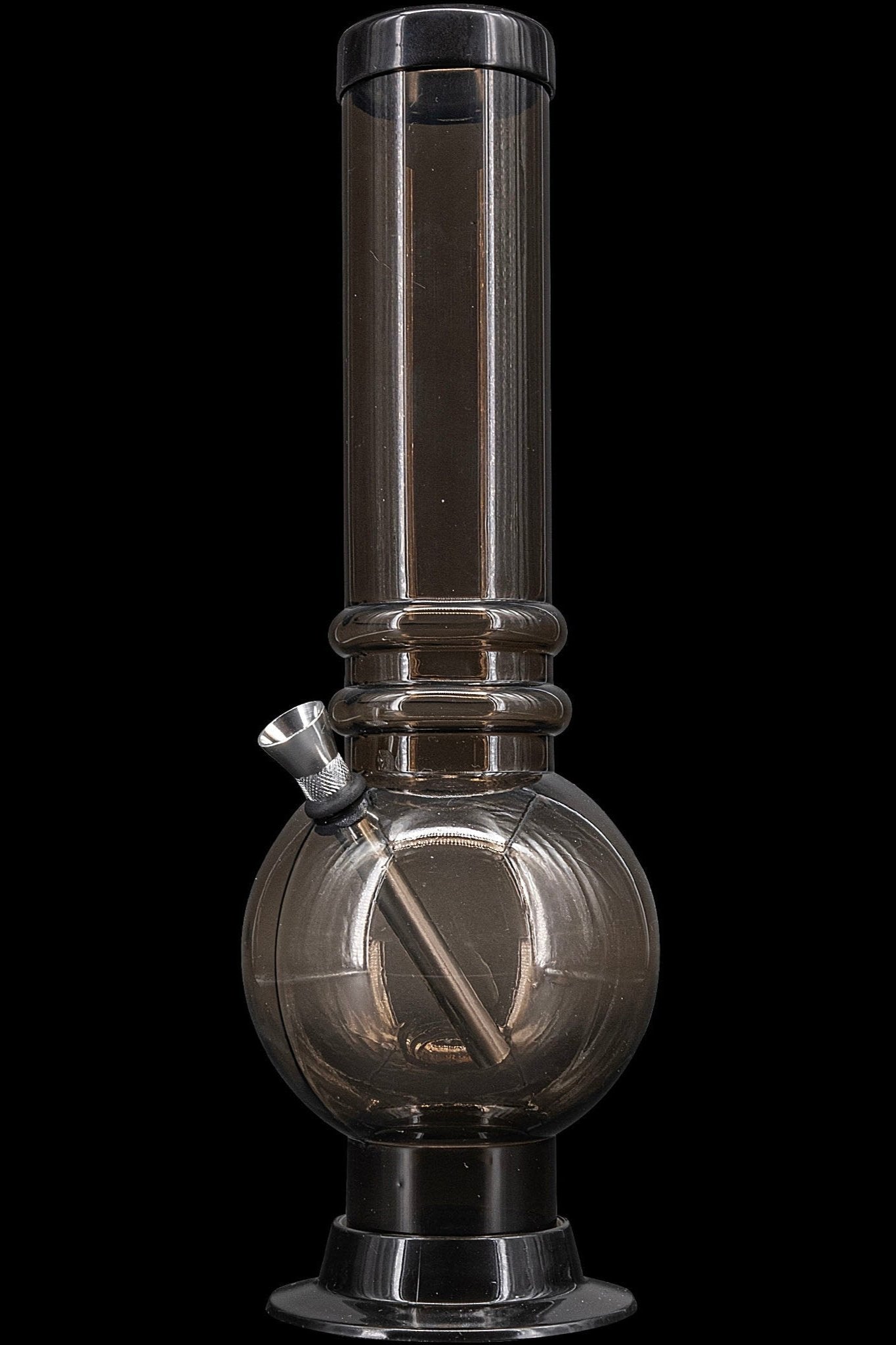 Smoked glass water pipe, also known as a bong, isolated on a black background.