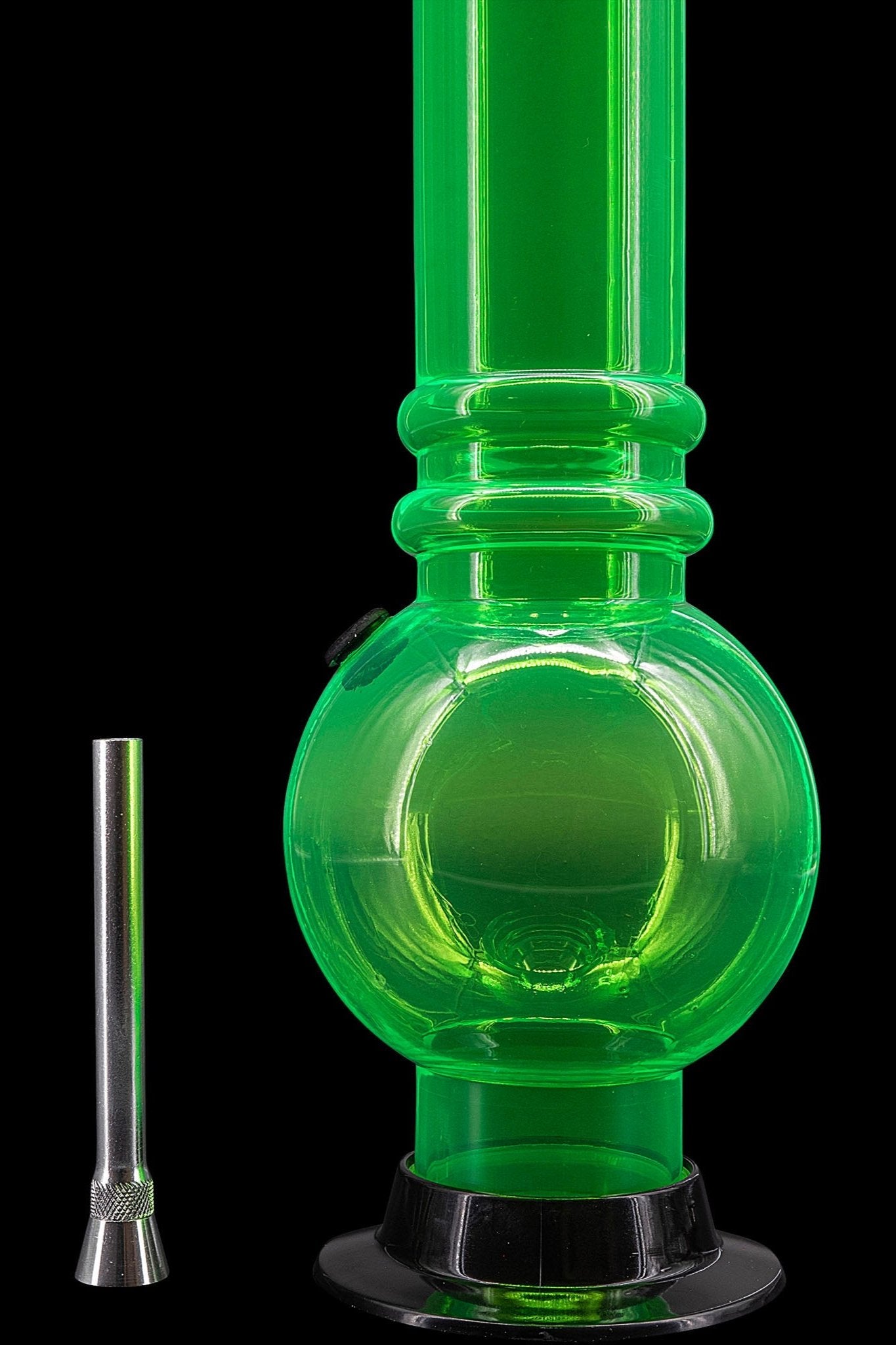 Green glass water pipe (bong) with a metal downstem, isolated on a black background.