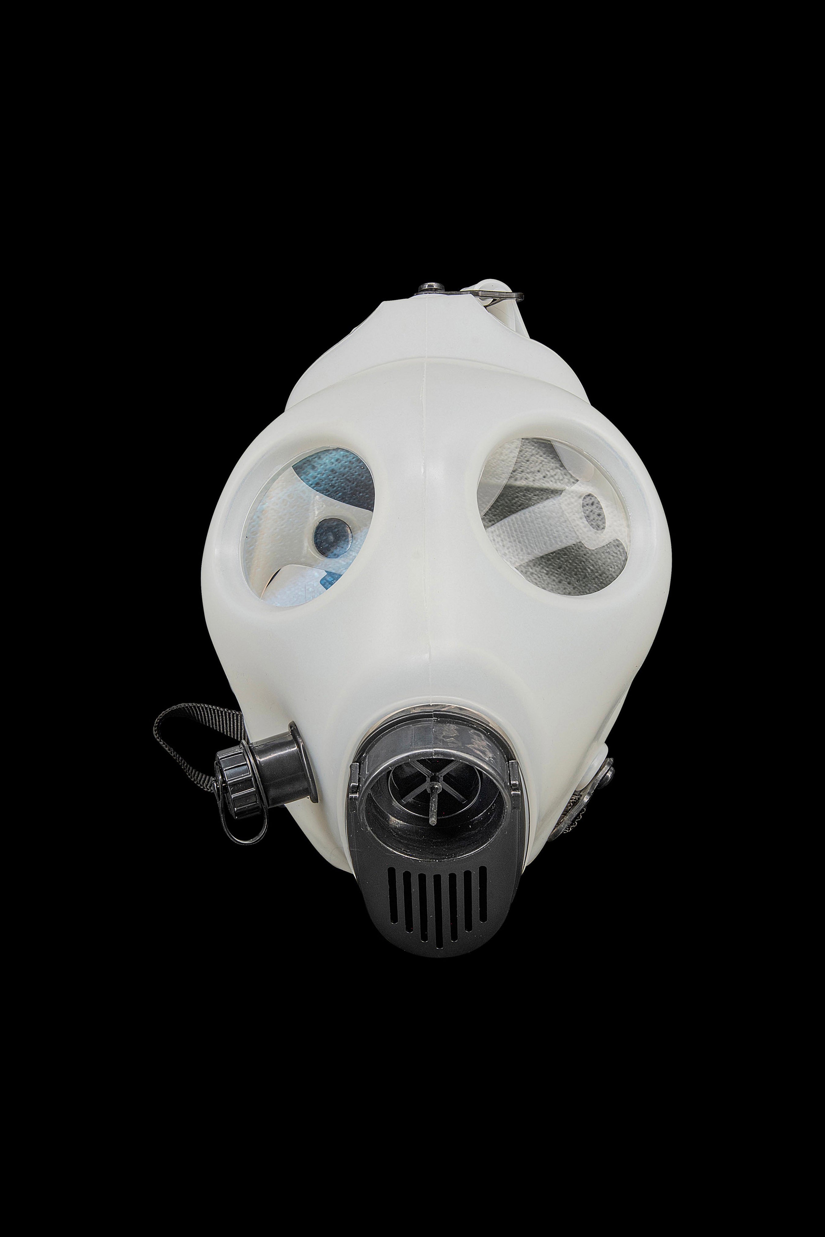 White gas mask with circular eye lenses, often associated with cannabis consumption accessories.