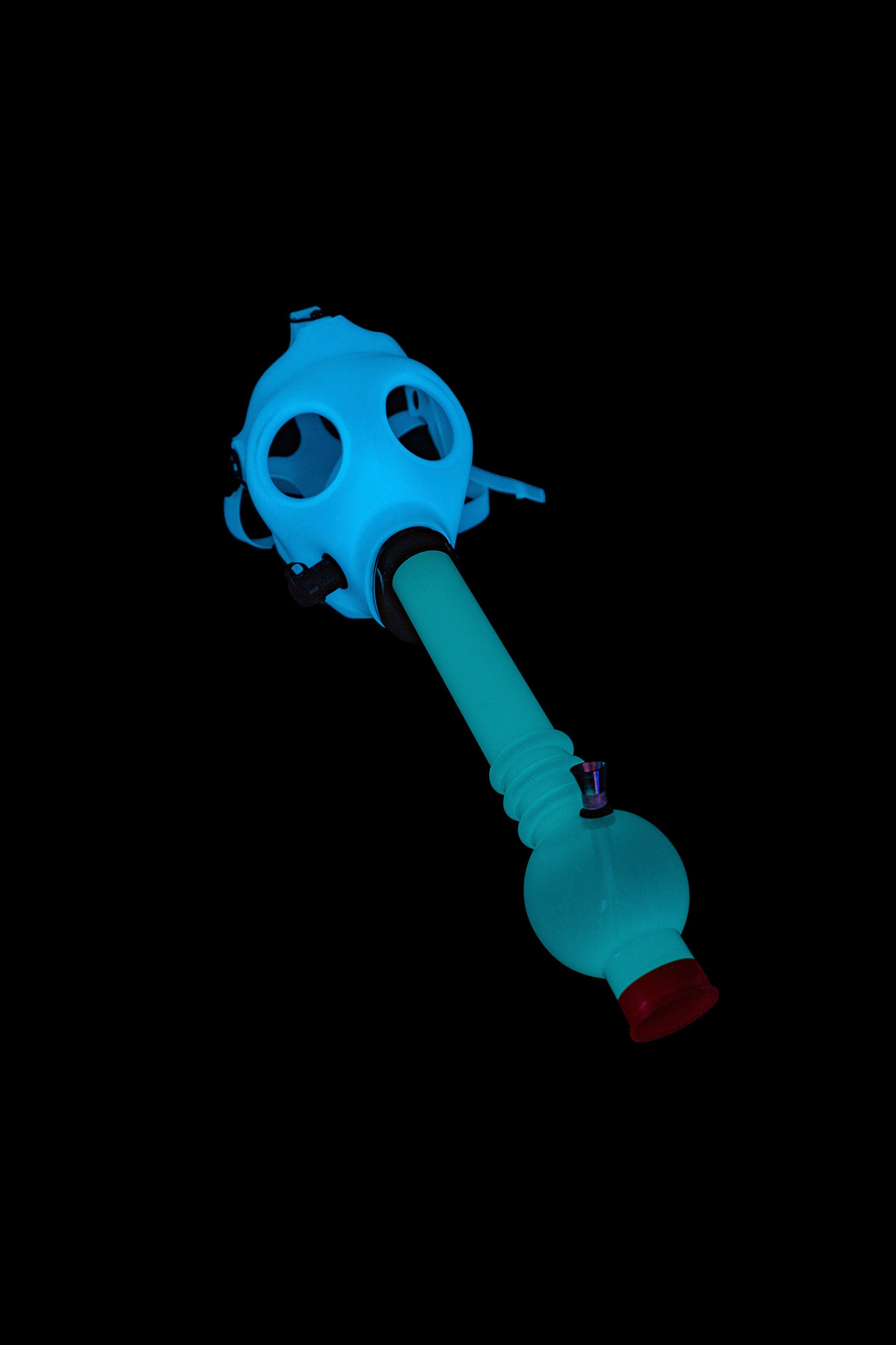 Glow-in-the-dark gas mask bubbler with a red mouthpiece.