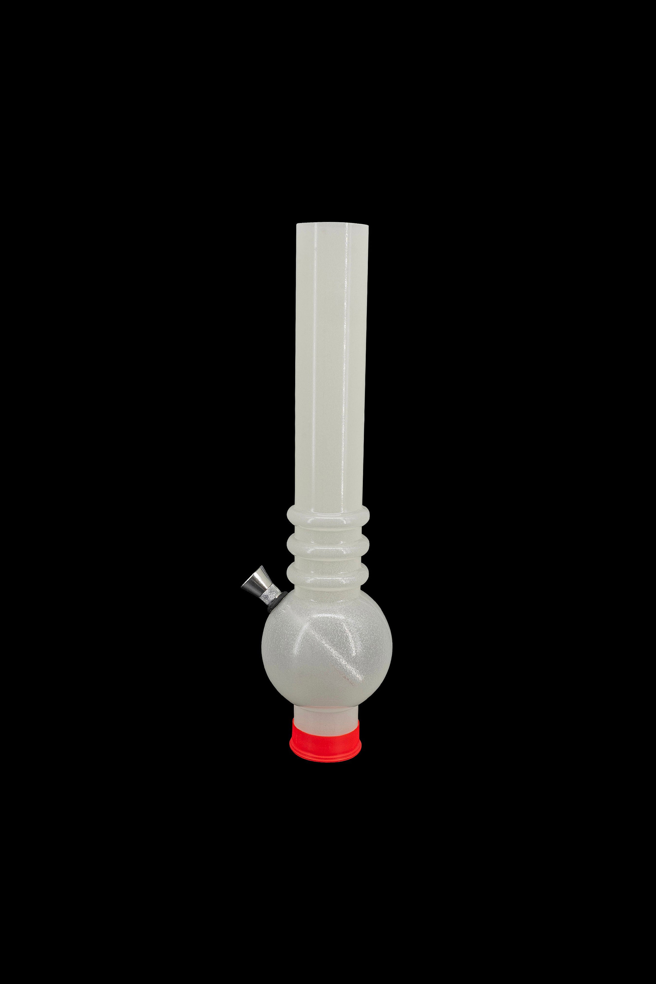 Clear acrylic water pipe with a red base, isolated on a black background.