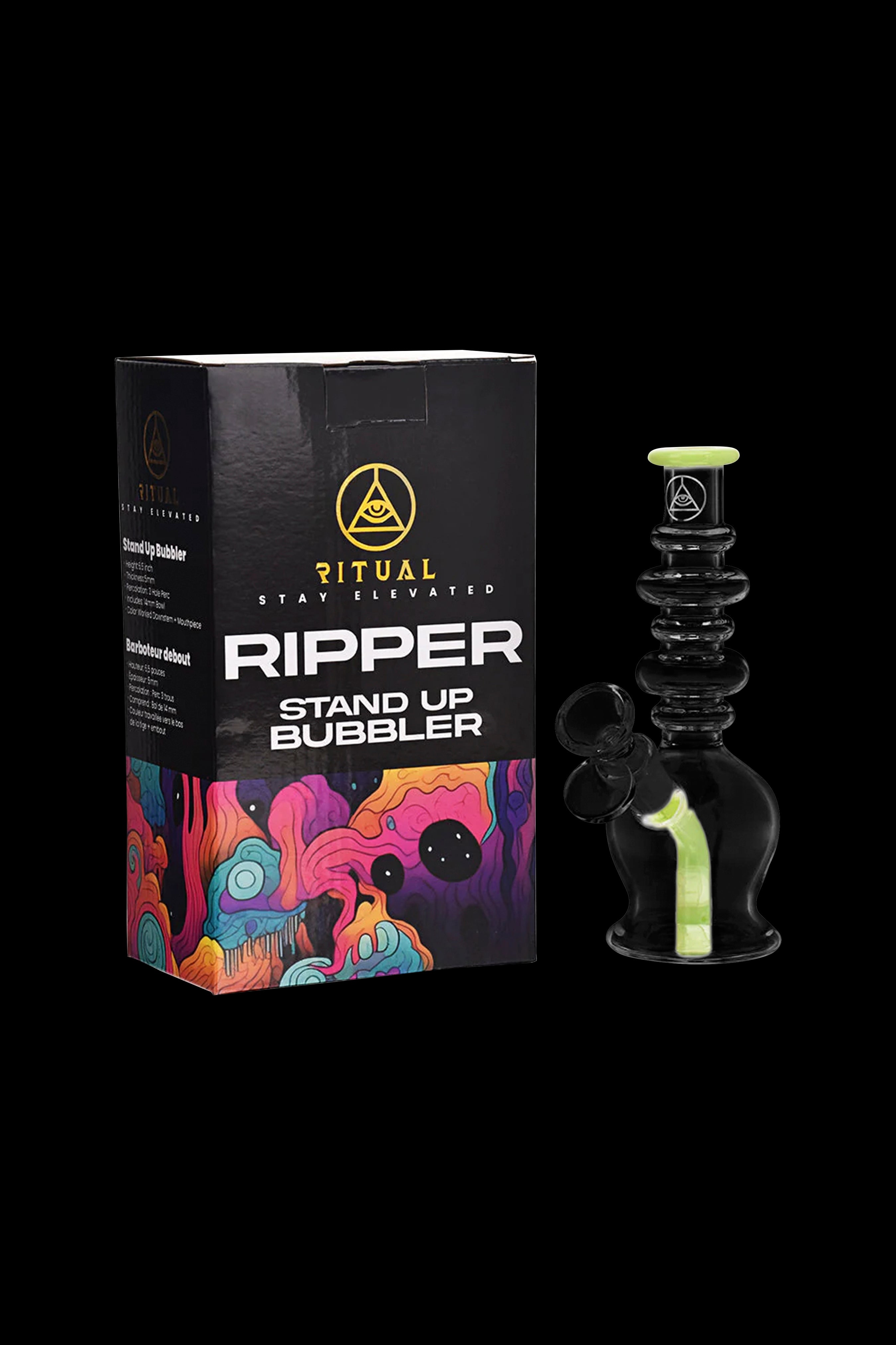A product shot of a “Ripper Stand Up Bubbler” for cannabis, featuring a colorful skull design on the box and the glass bubbler itself.