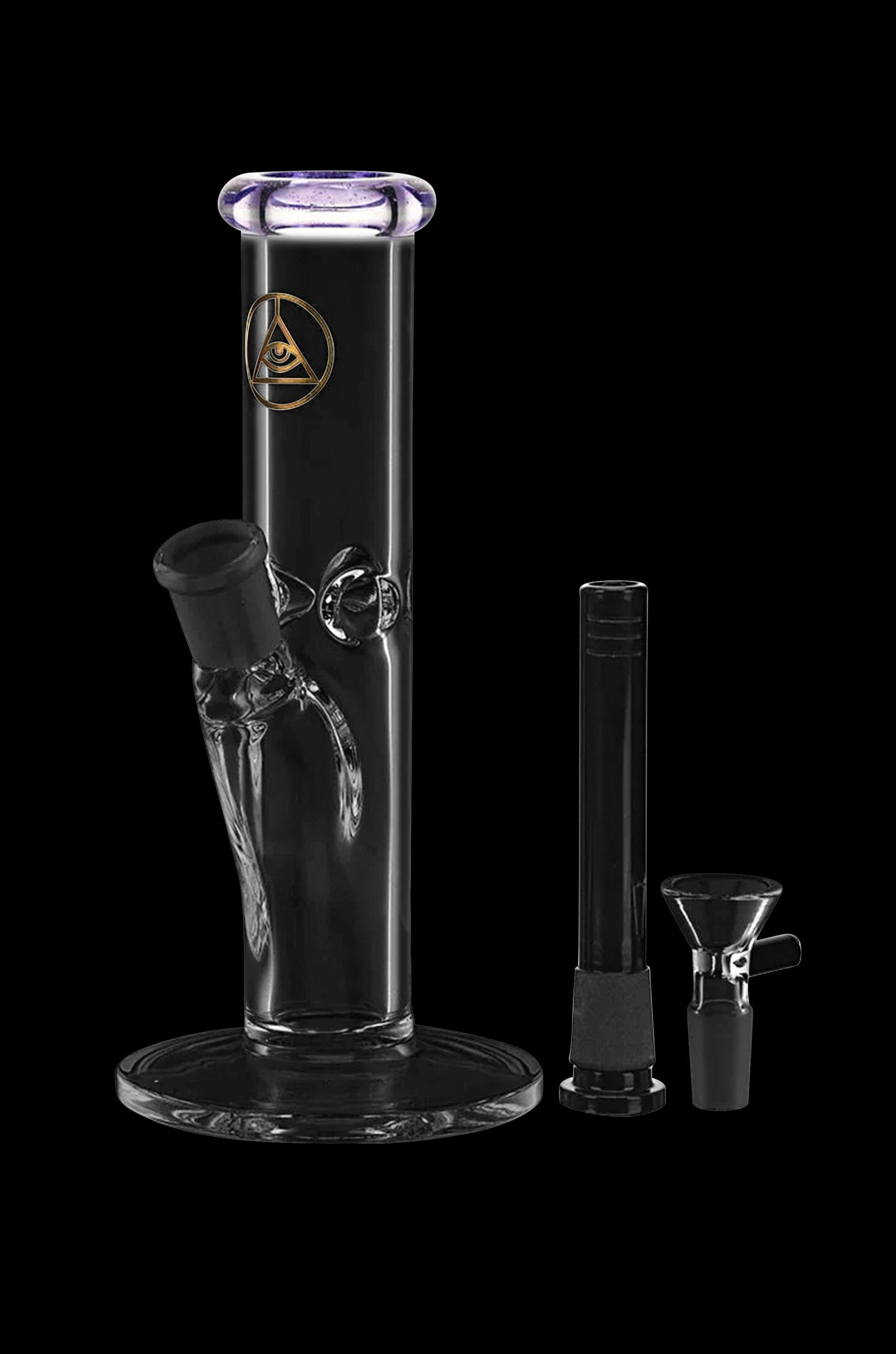 Glass water pipe (bong) with intricate skeletal design, accompanied by a downstem and glass bowl, isolated on a black background.