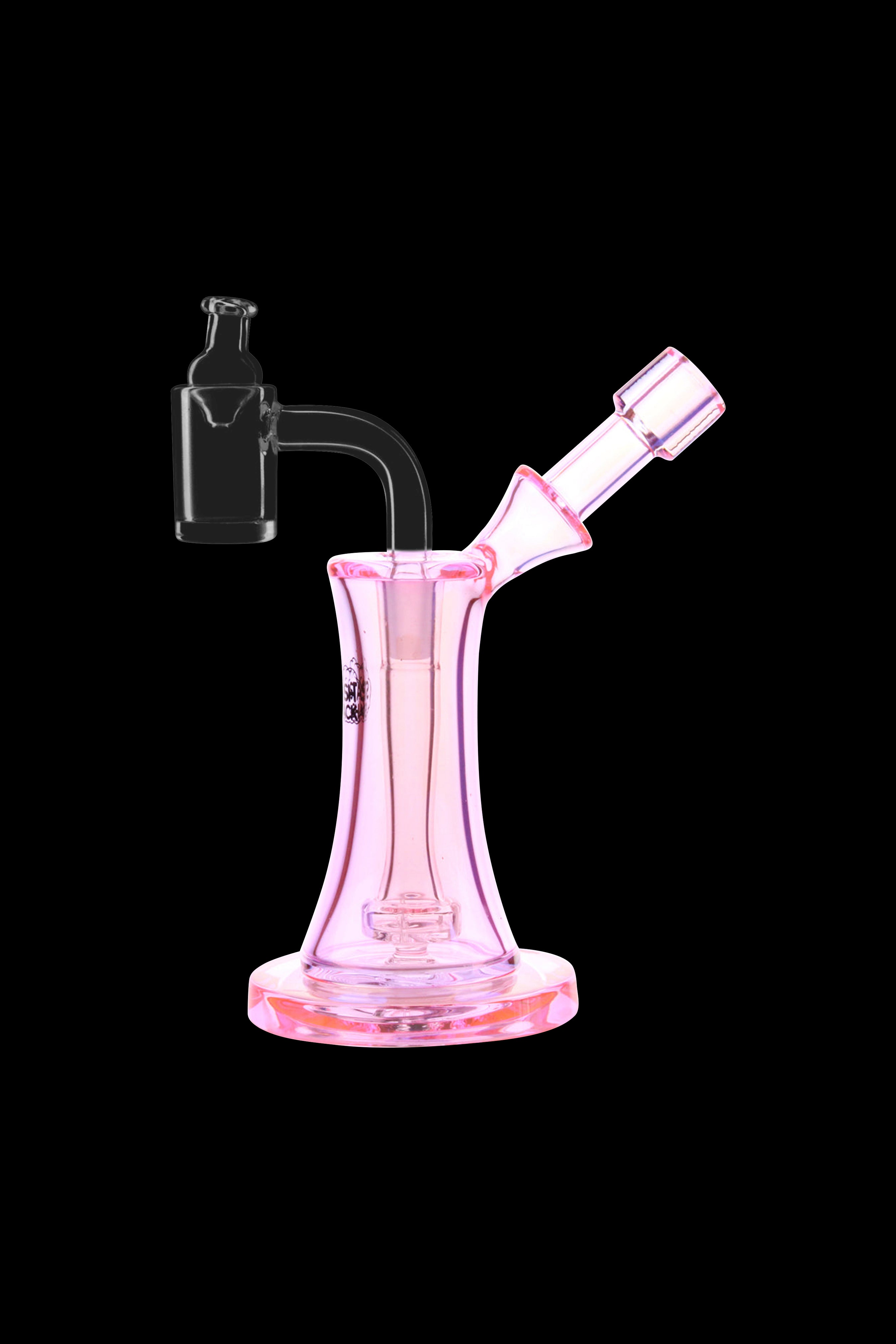Pink glass rig with a quartz banger and mouthpiece.