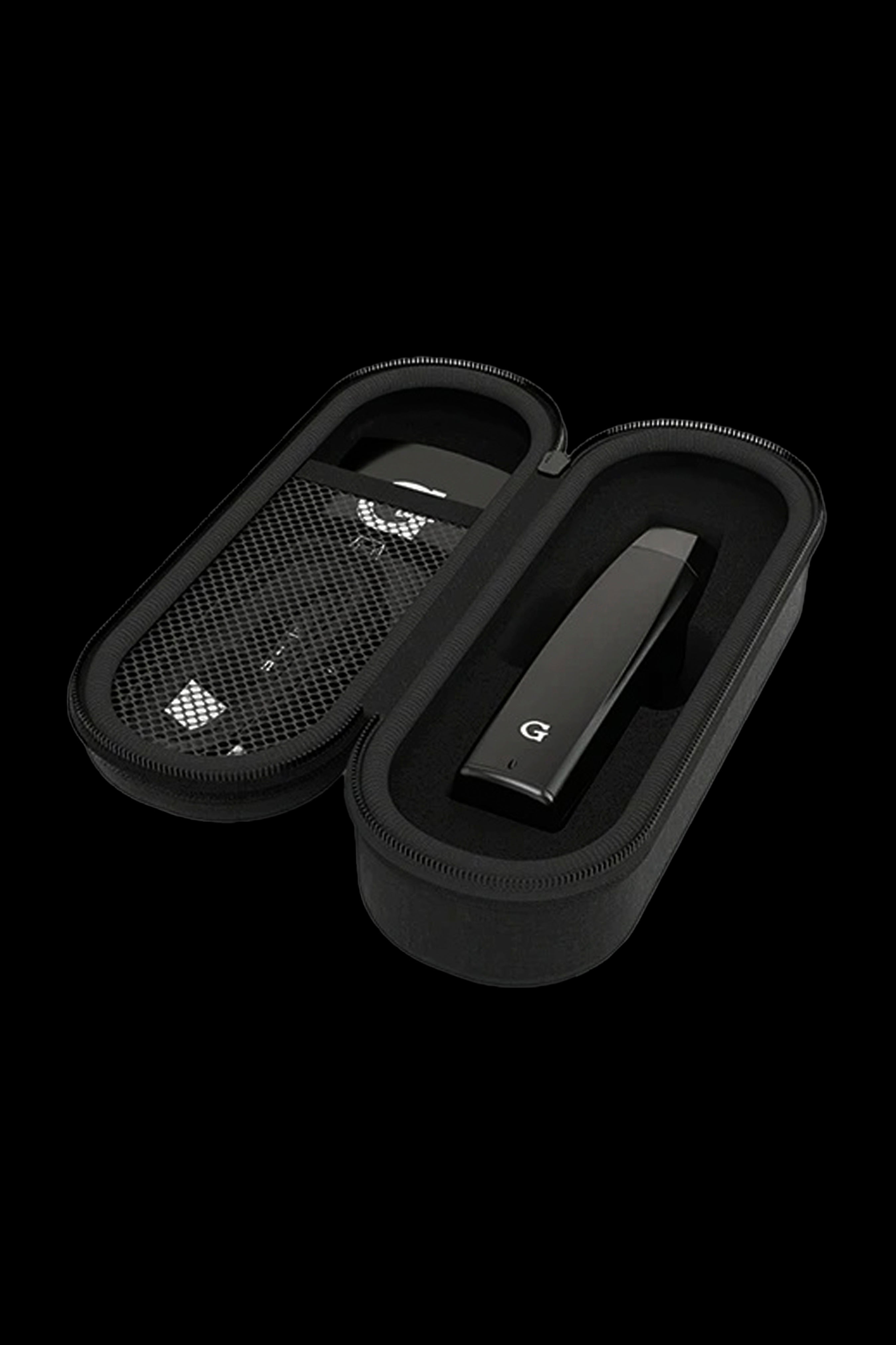 Black G Pen Dash vaporizer pen inside its open protective case.
