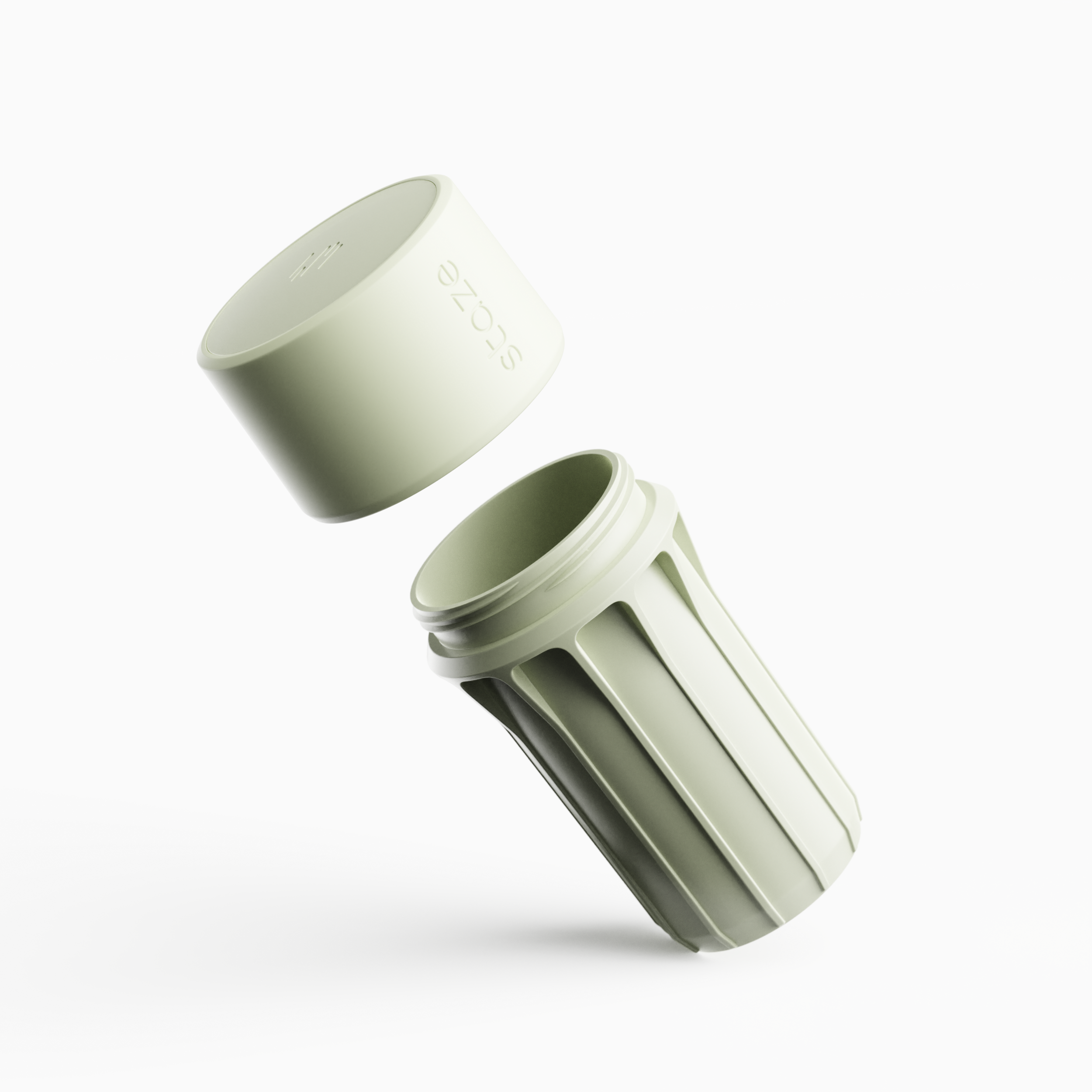 Angled close-up of a pale green STAZE PRESERVE lid and threaded body floating against a bright white background.