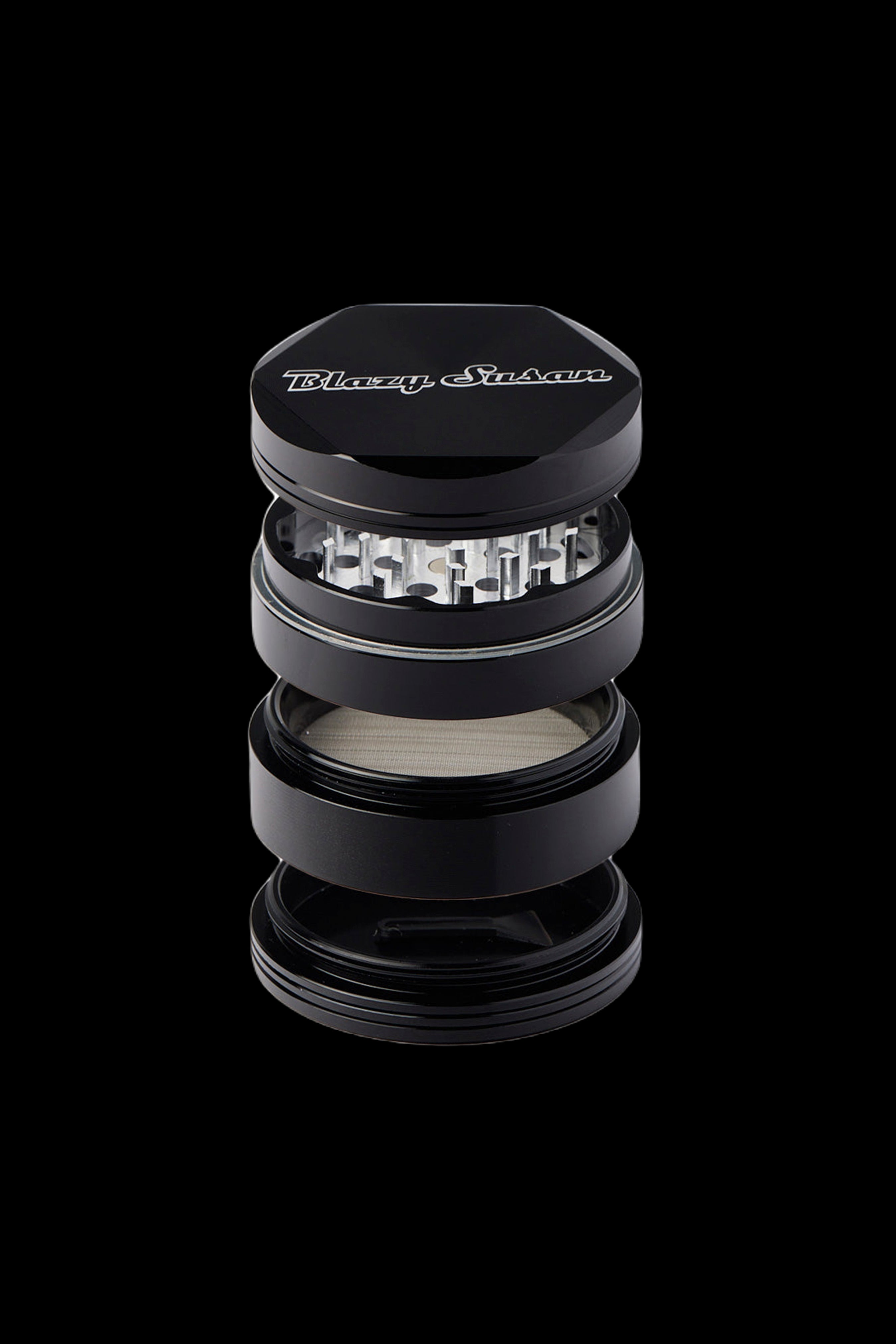 Black four-piece grinder with “Blazy Susan” logo, partially disassembled to show internal components.