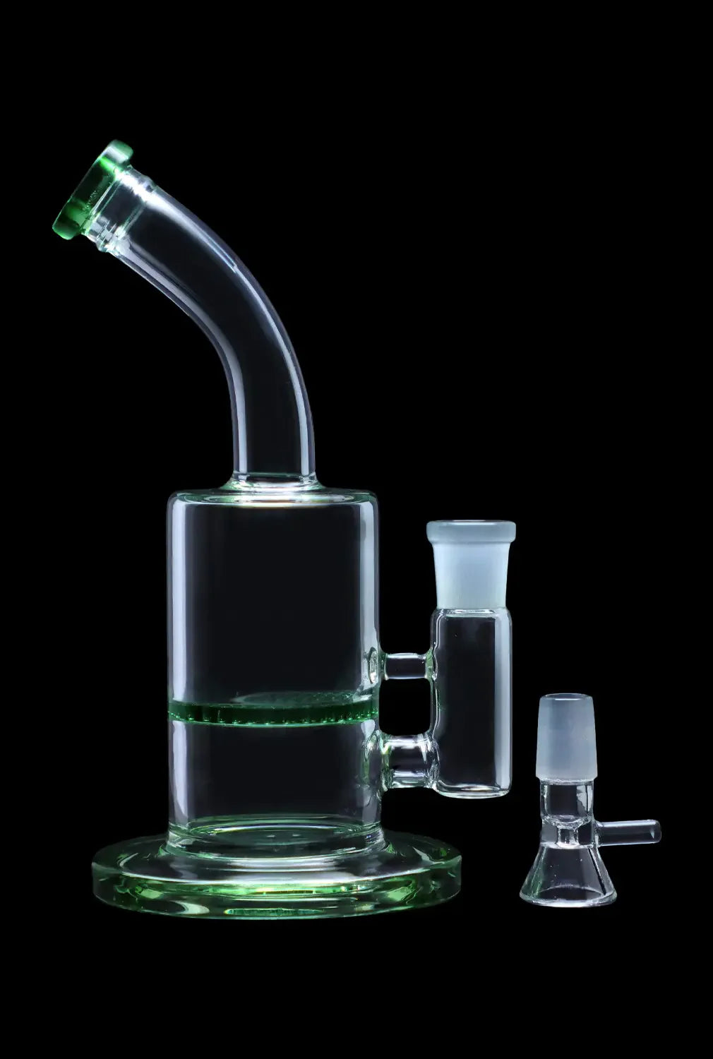 Clear glass water pipe (bong) with green accents and separate downstem and bowl, isolated on black.