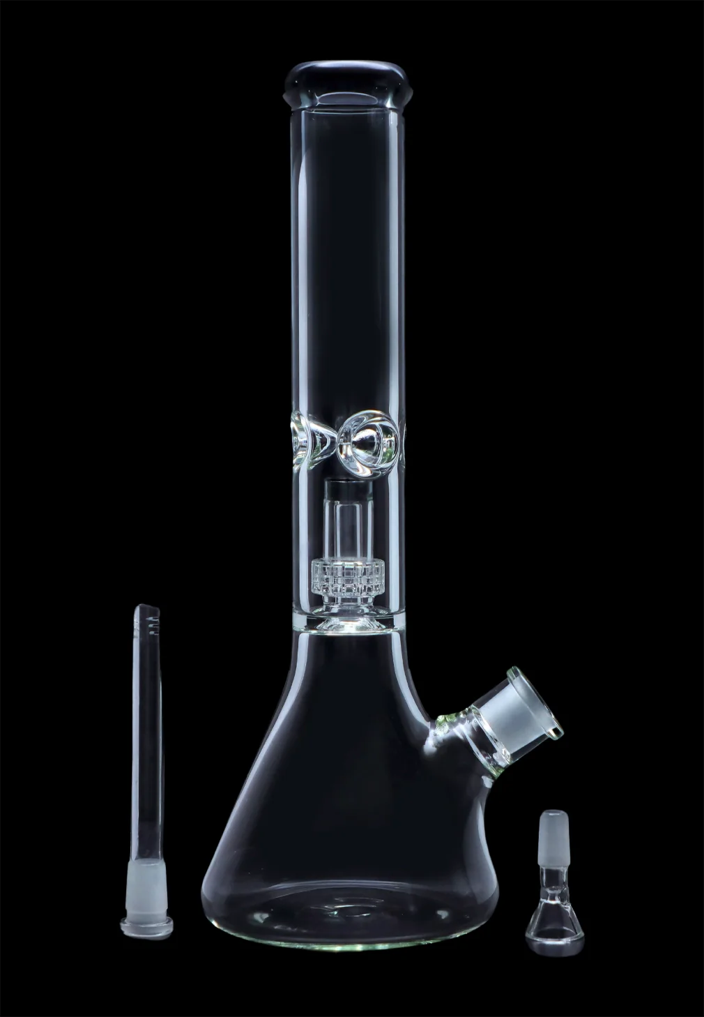 Clear glass bong with ice catcher and downstem, displayed with separate glass pieces on a black background.