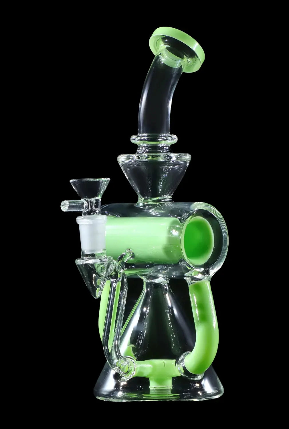 Green glass water pipe (rig) with intricate bubbler design, isolated on a black background.