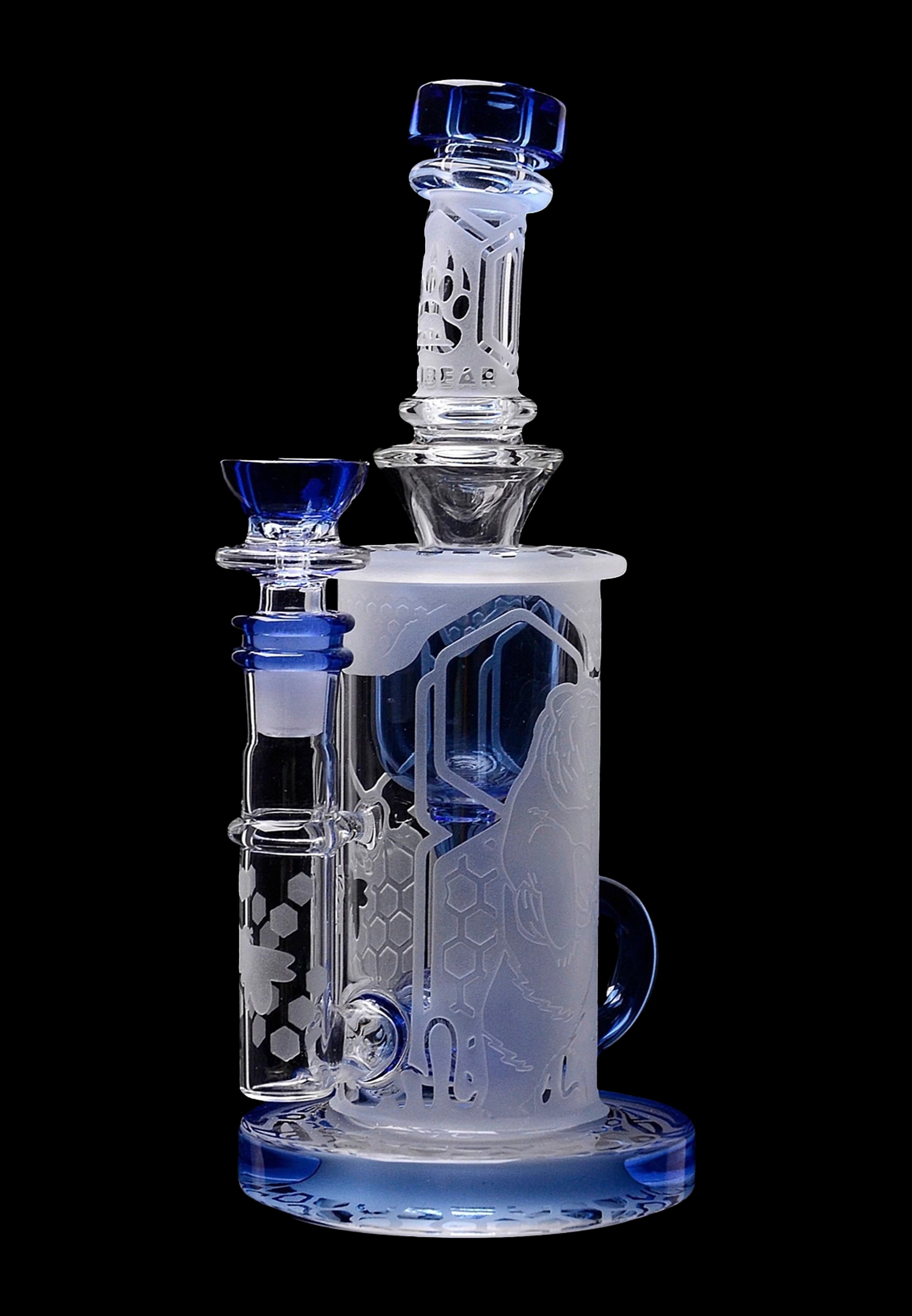 Blue and clear glass water pipe (bong) with intricate etched designs.