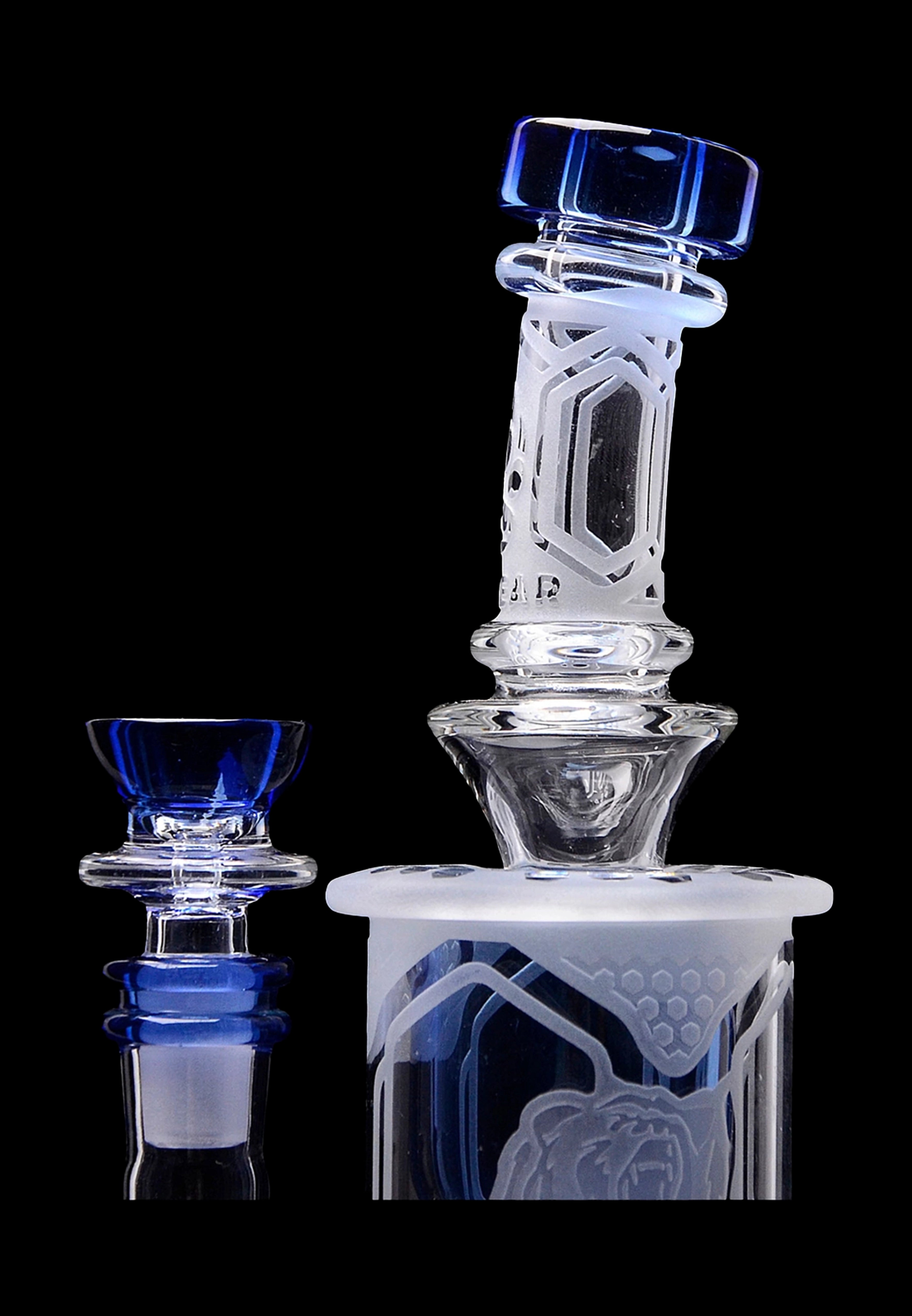 Blue and clear glass dab rig with intricate designs, including a separate bowl piece.