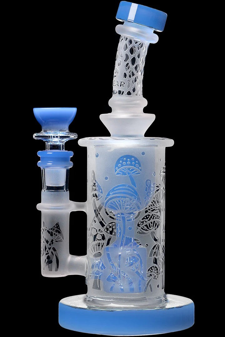 Clear glass water pipe (bong) with intricate mushroom etchings and blue accents.