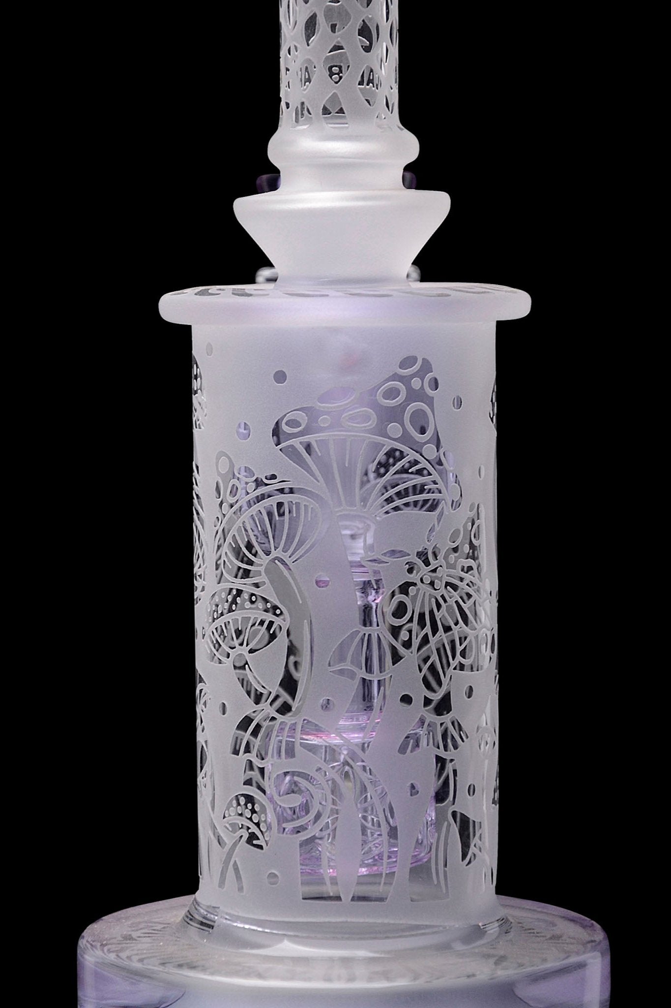 Frosted glass water pipe with intricate butterfly designs, illuminated in purple.