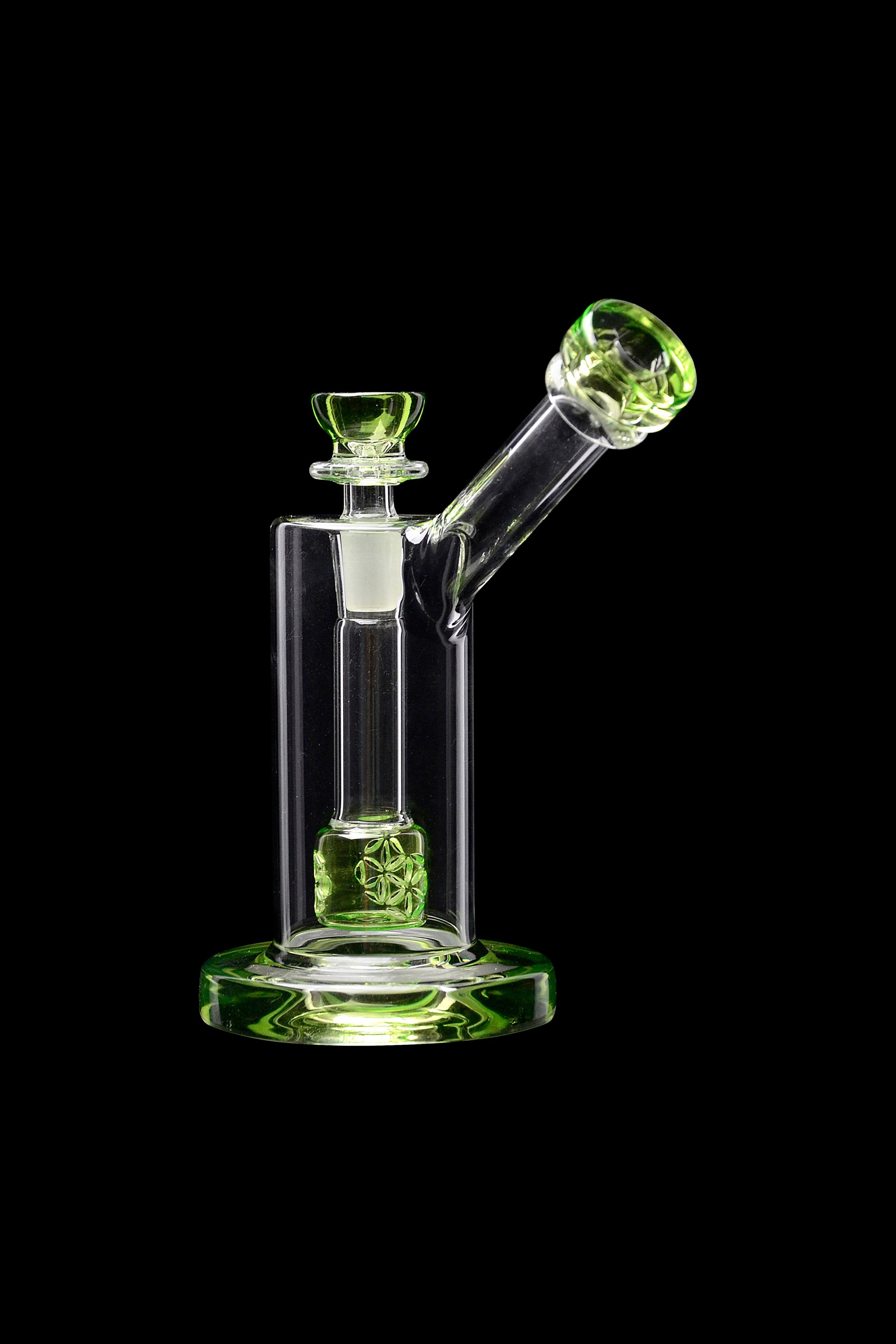 Green glass rig with percolator, isolated on black.