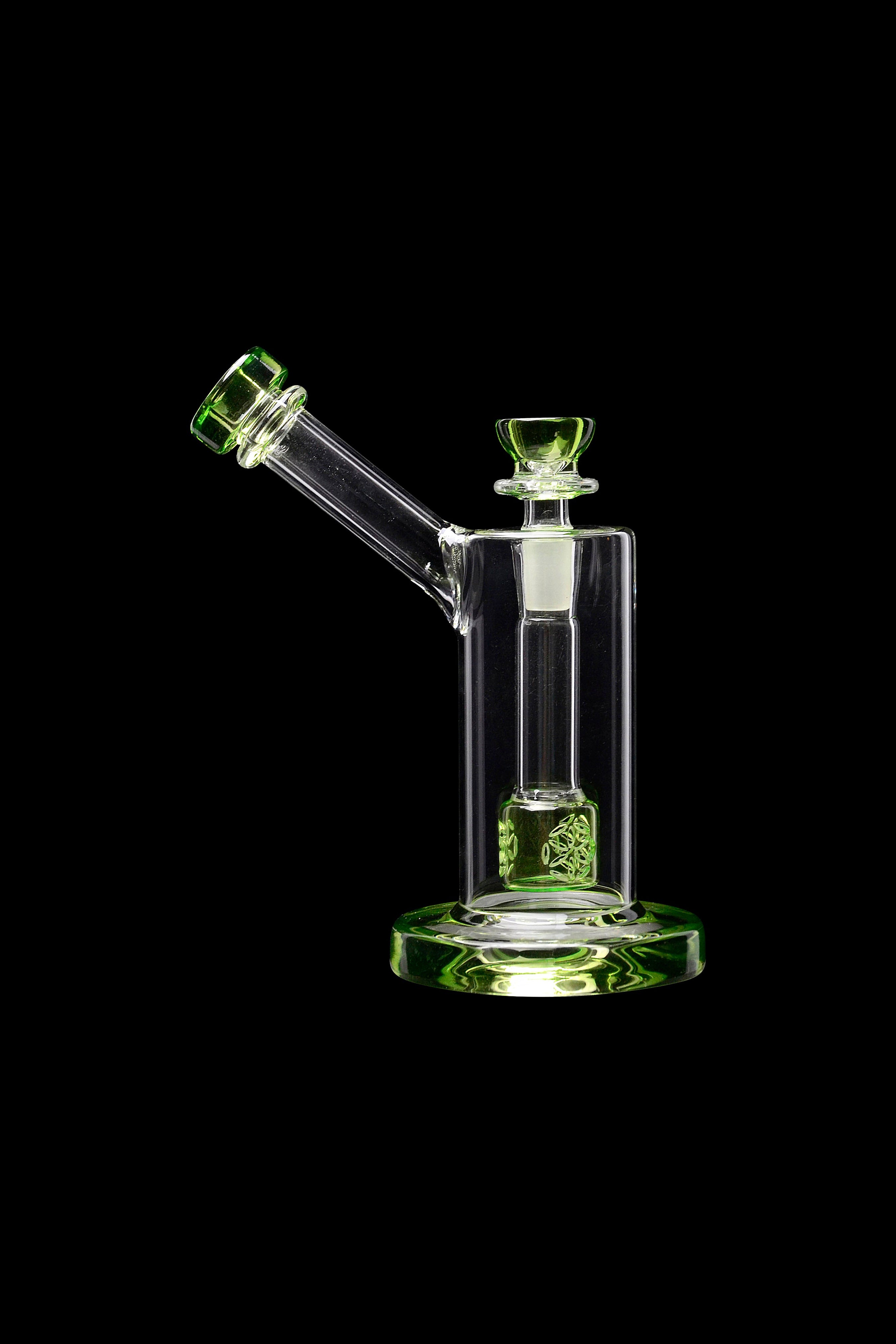 Green glass water pipe (rig) isolated on a black background.
