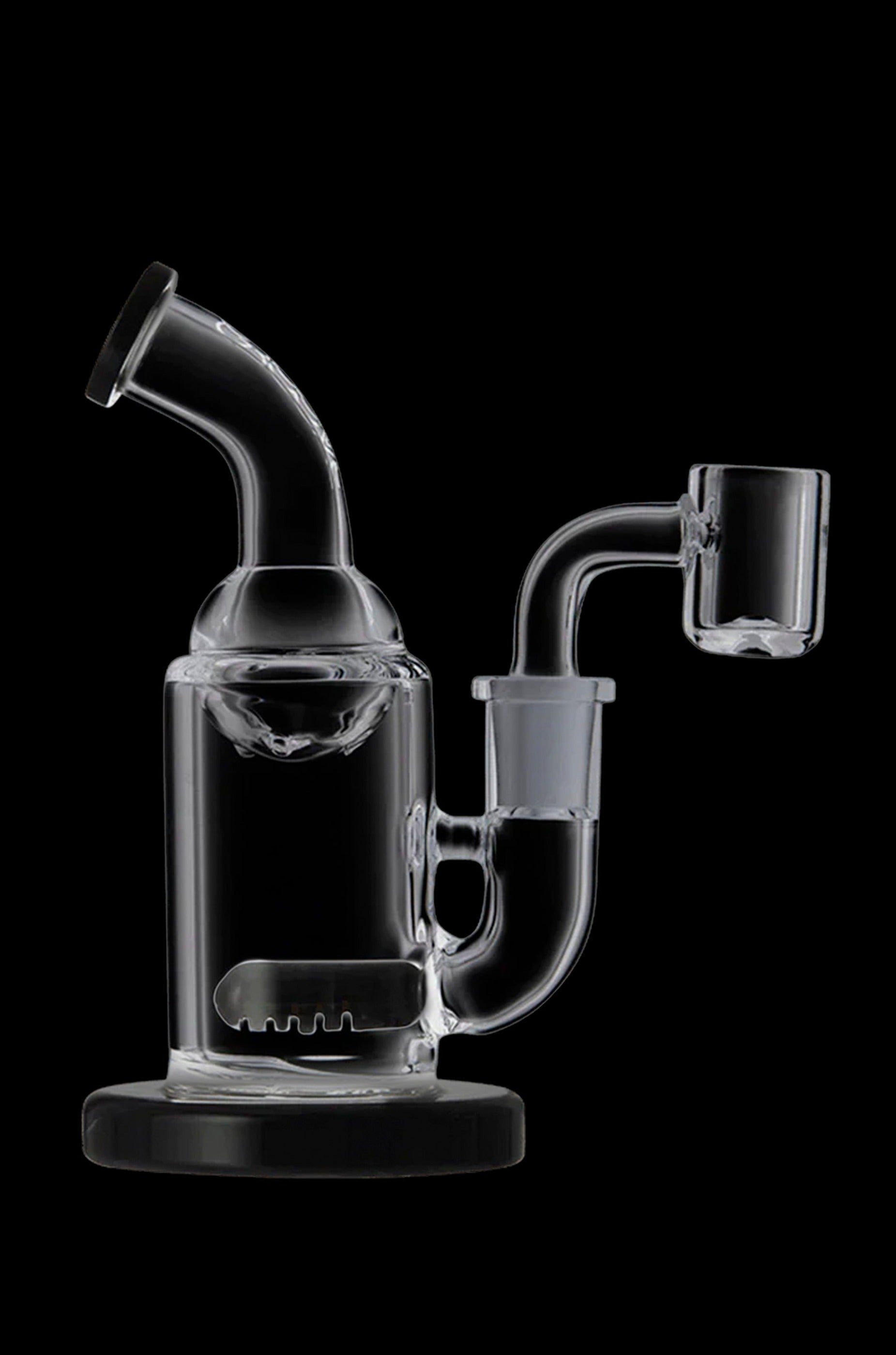 Clear glass dab rig with a bubbler and quartz banger, isolated on a black background.