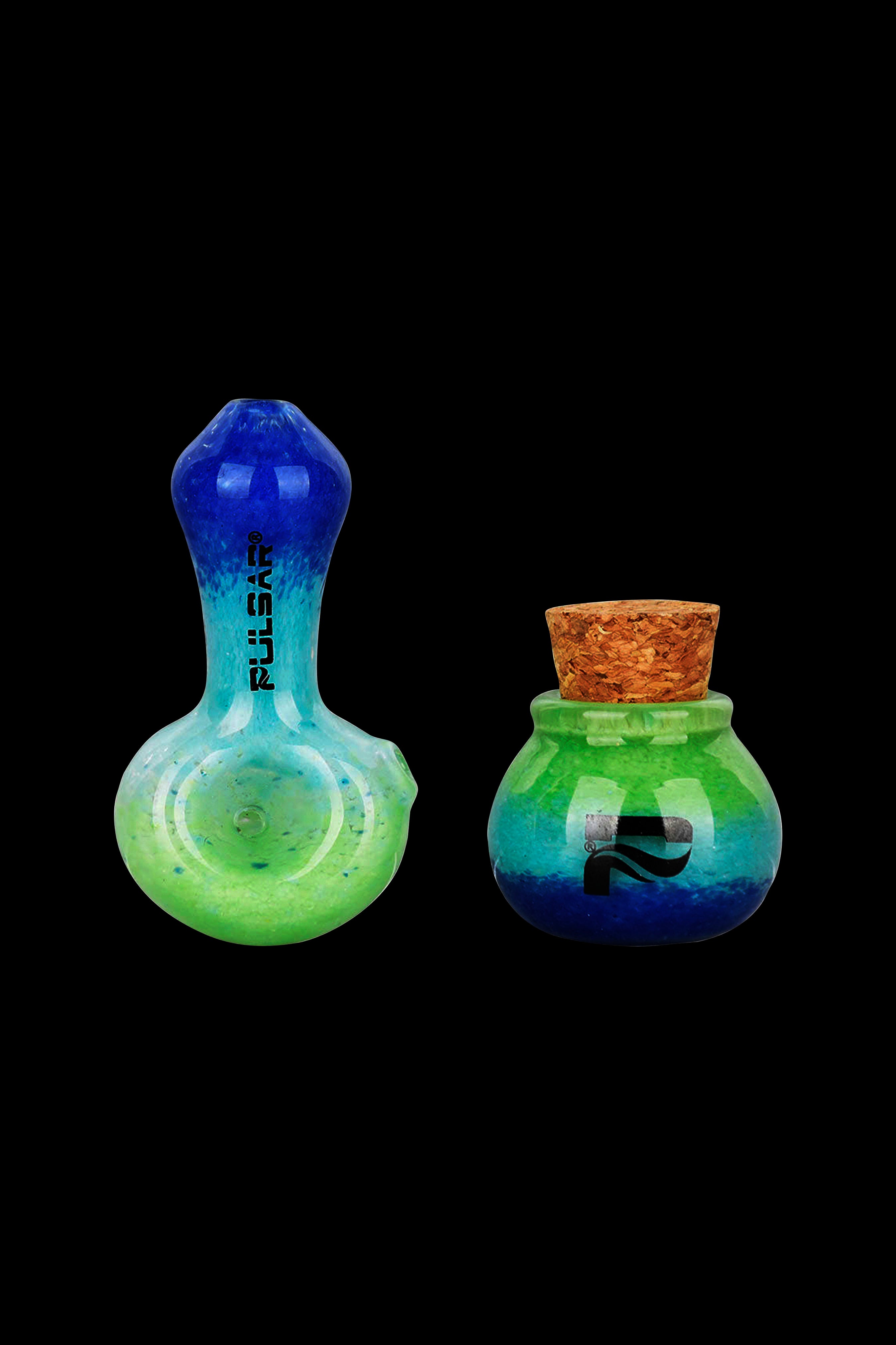 Blue and green glass cannabis pipes with “RY2” branding, against a black background.