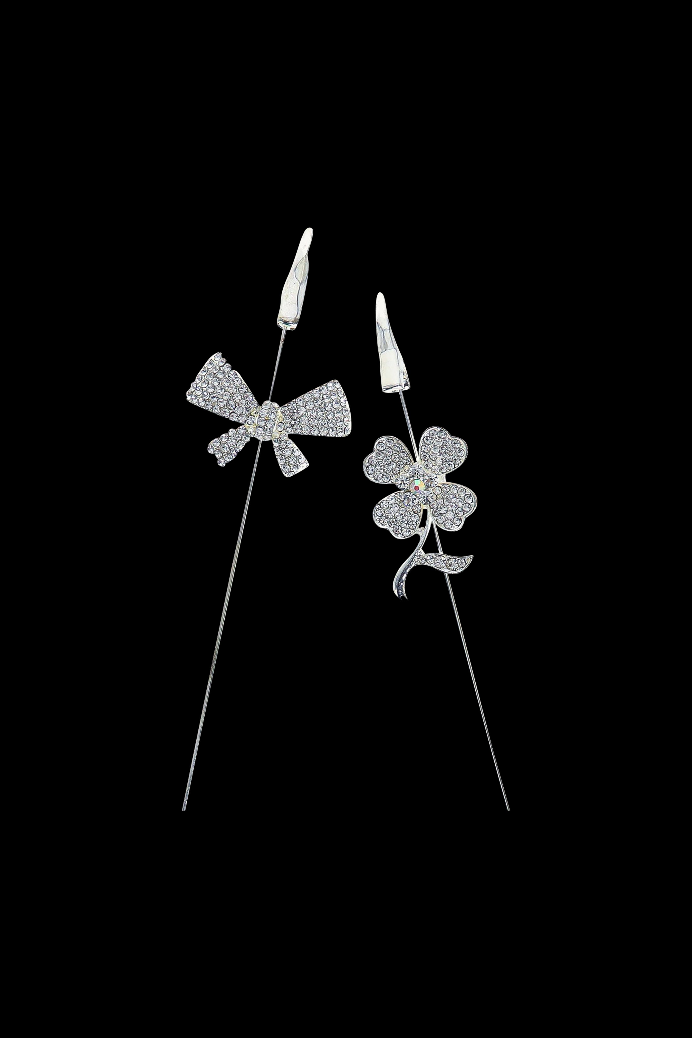 Diamond cannabis flower and bud earrings on black background.