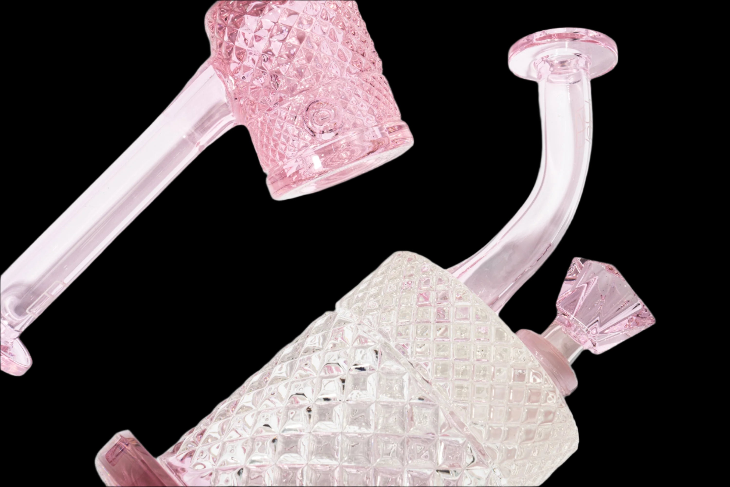 Pink glass rig with textured, crystalline surface and curved mouthpiece, isolated on a black background.