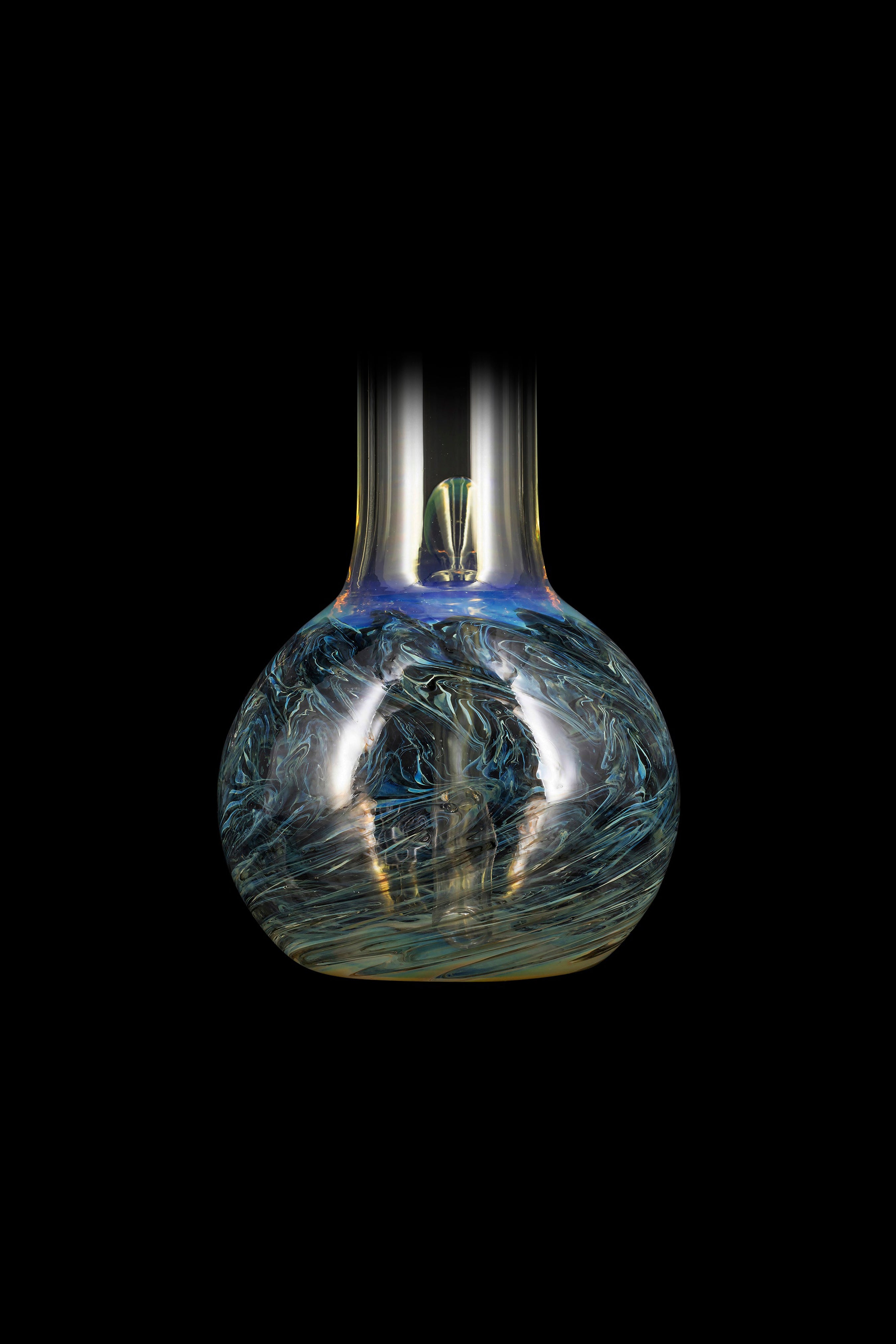 Blue and green patterned glass water pipe against a black background.