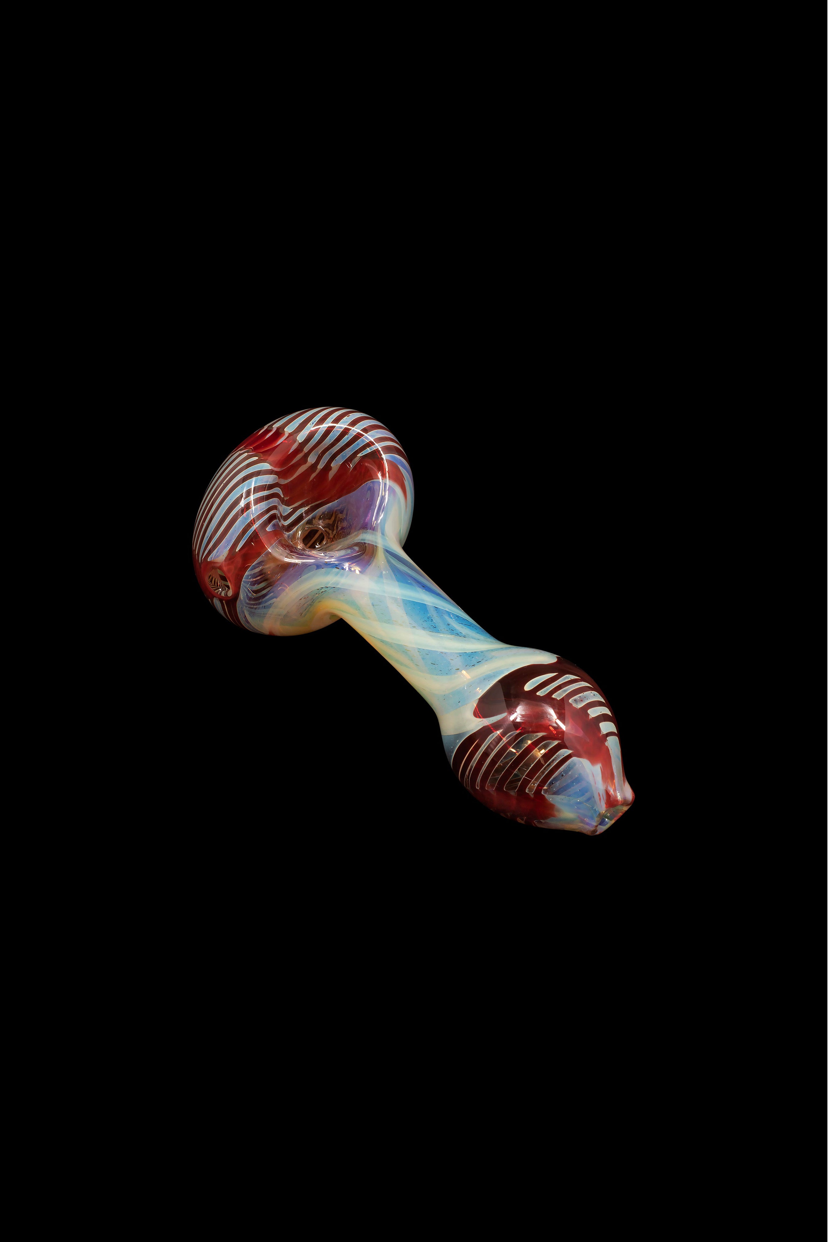 Hand pipe with red and white striped glass and iridescent blue accents.