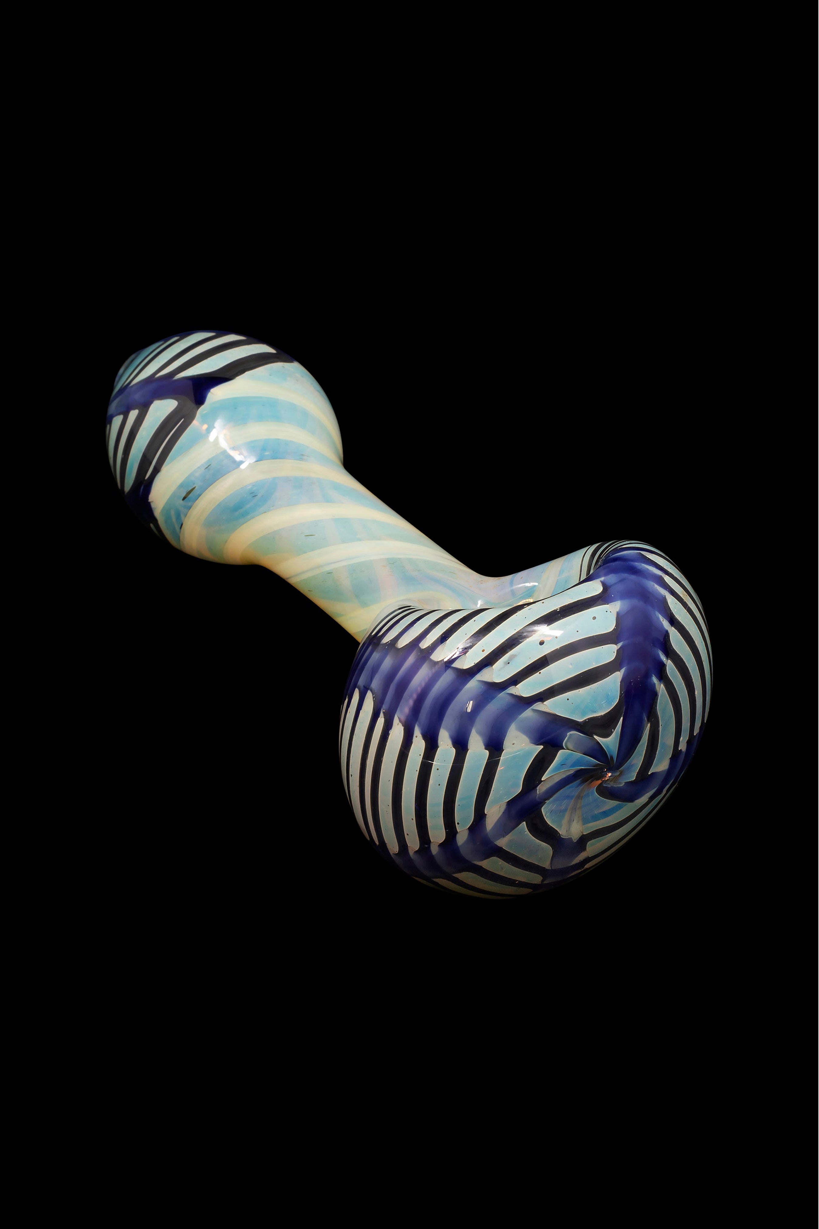 Hand-blown glass pipe with blue and white swirling patterns.
