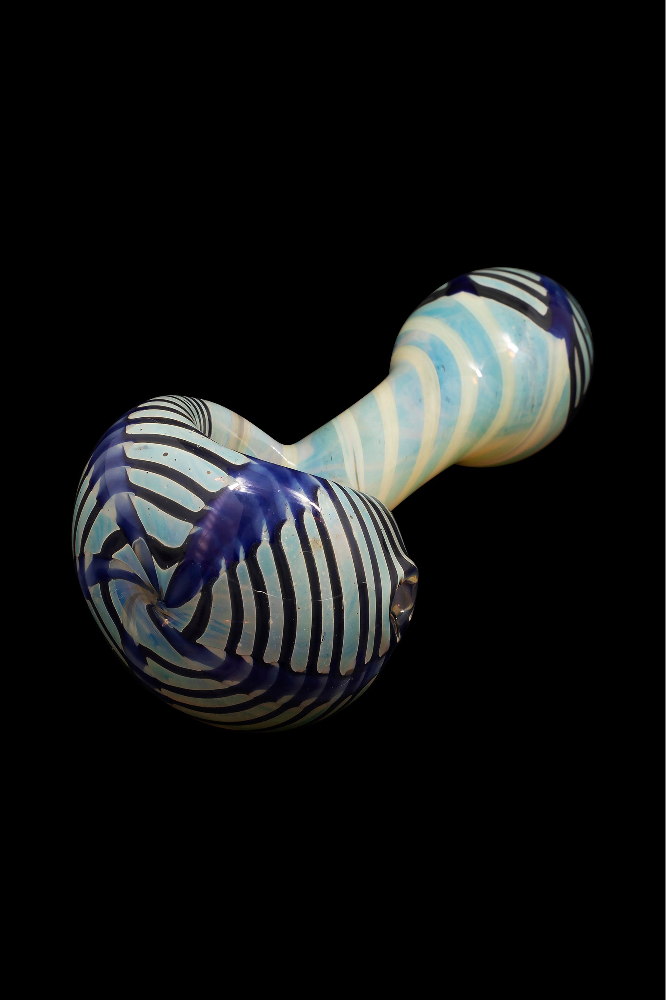 Blue and white striped glass pipe against a black background.
