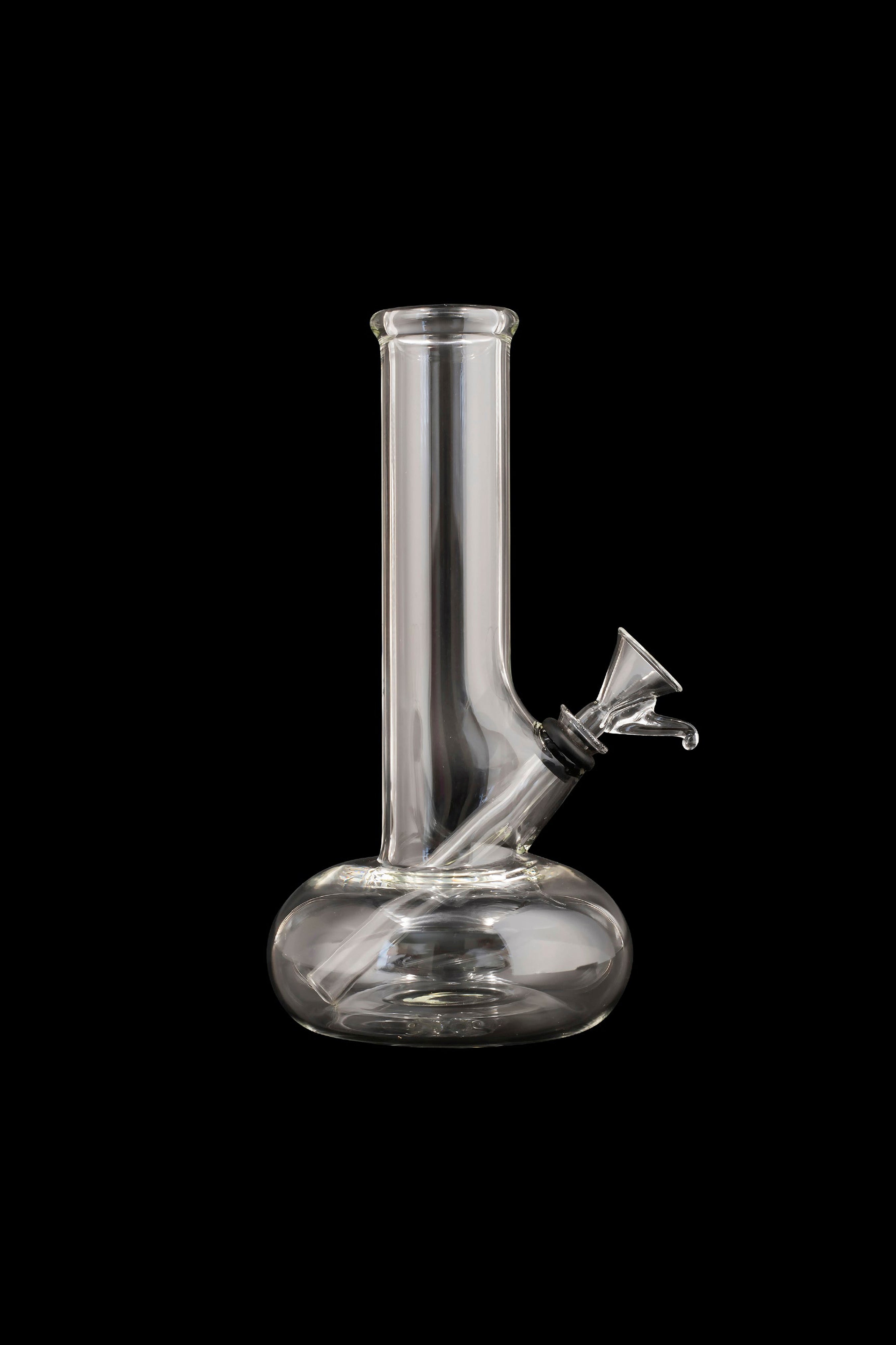Clear glass water pipe (bong) against a black background.