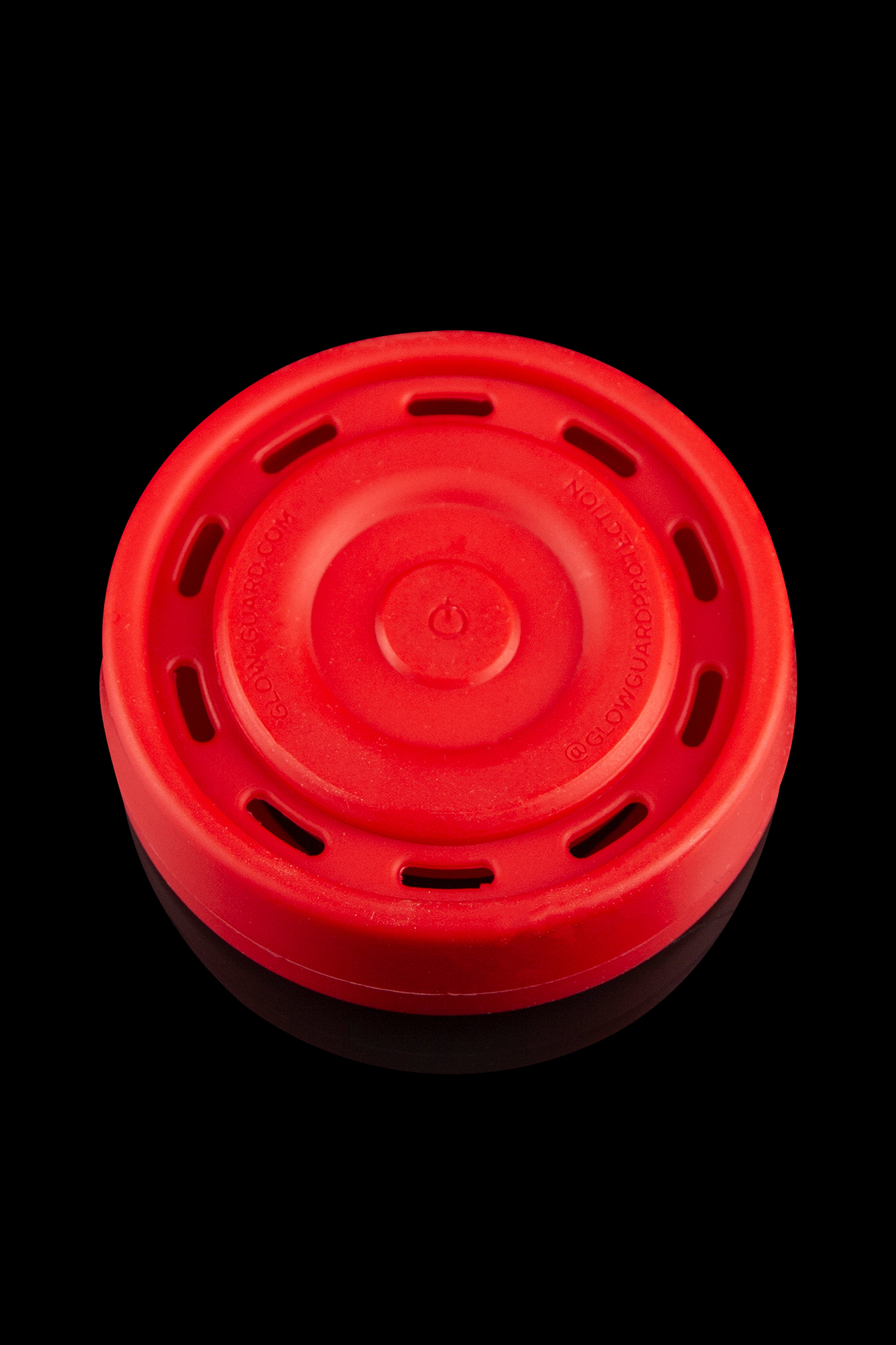 Red silicone carb cap for cannabis concentrates.