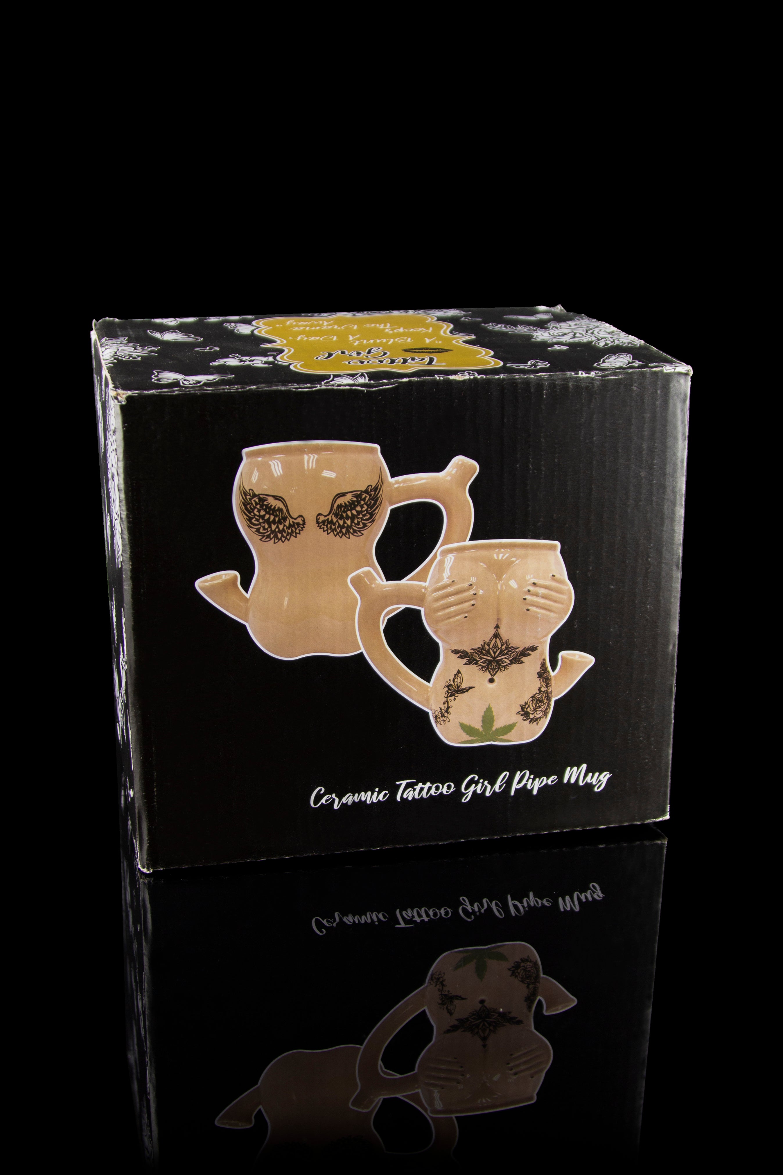 Cardboard box for a "Ceramic Tattoo Girl Pipe Mug" with images of the ceramic mug featuring a tattooed woman design.
