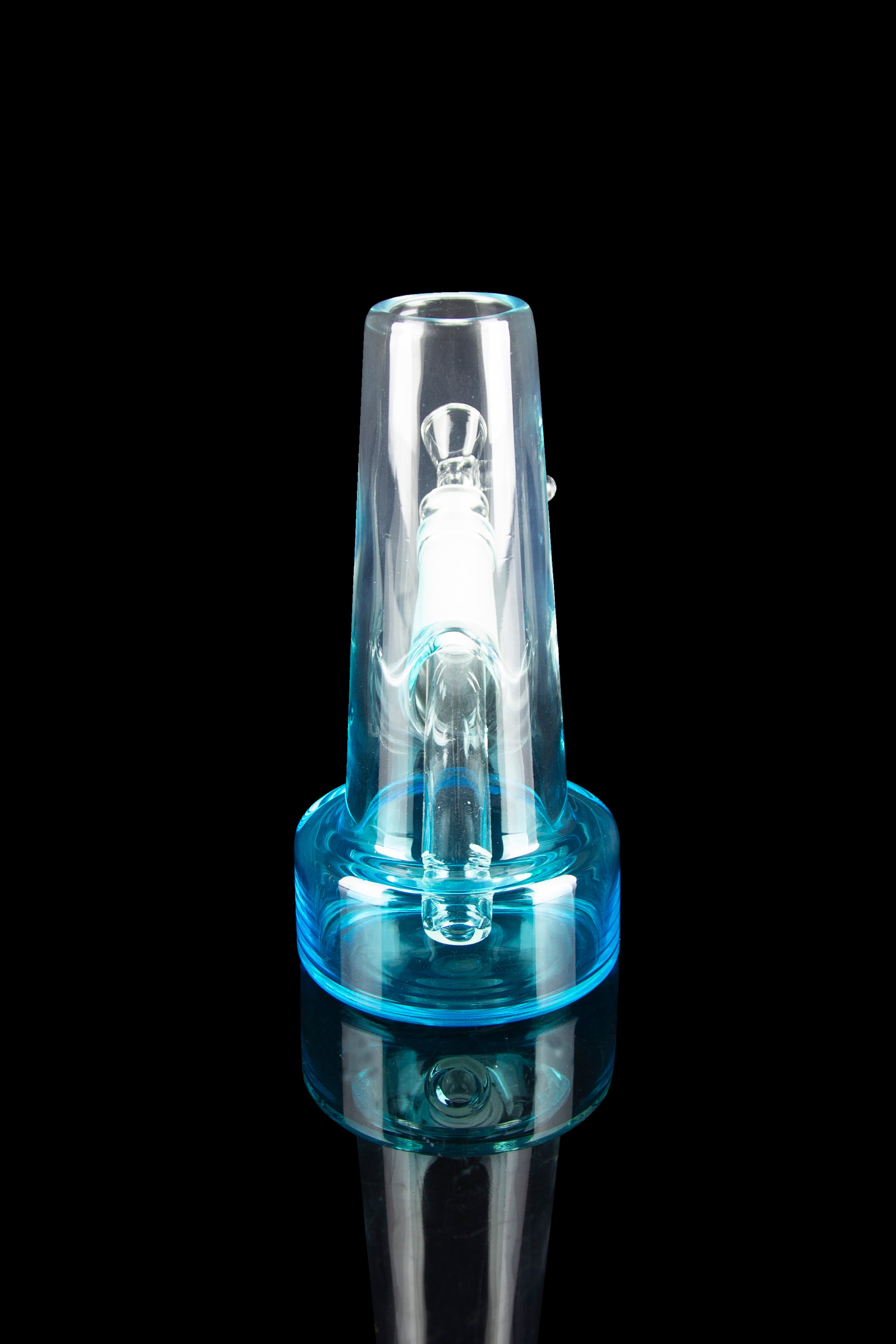Clear glass water pipe (rig) with blue accents, studio shot on a reflective surface.