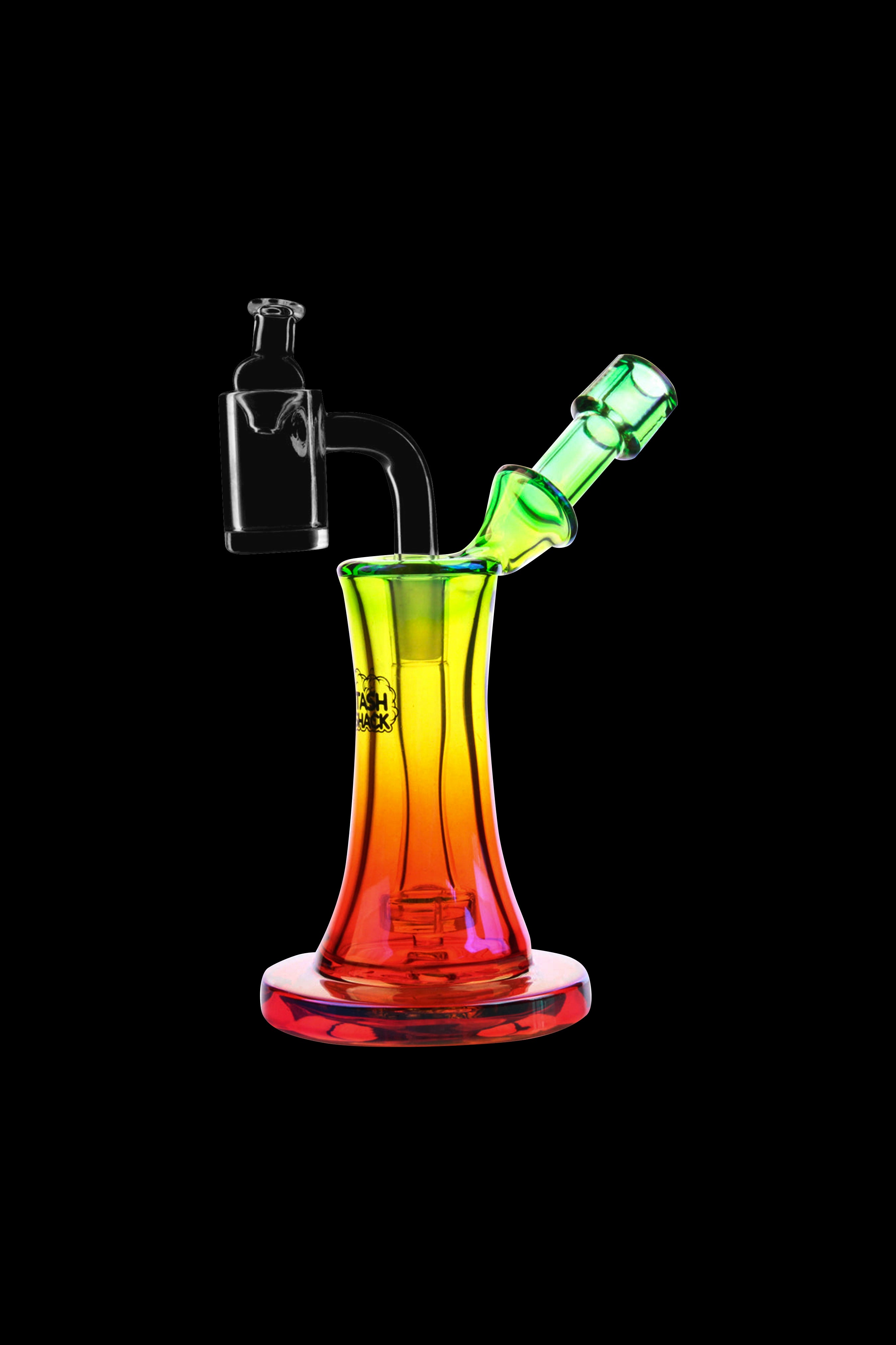 Colorful glass dab rig with quartz banger and mouthpiece against a black background.