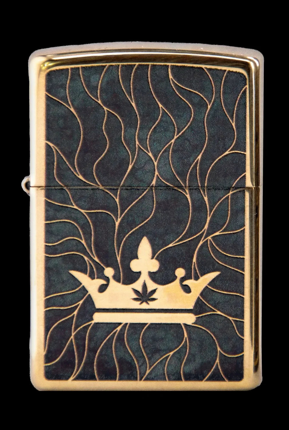 Gold Zippo lighter with a black background featuring a golden crown and cannabis leaf design.