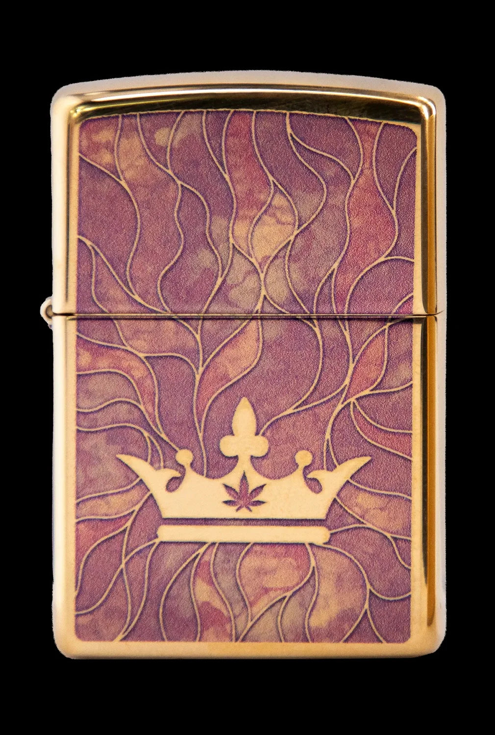 Gold lighter engraved with a crown and cannabis leaf.