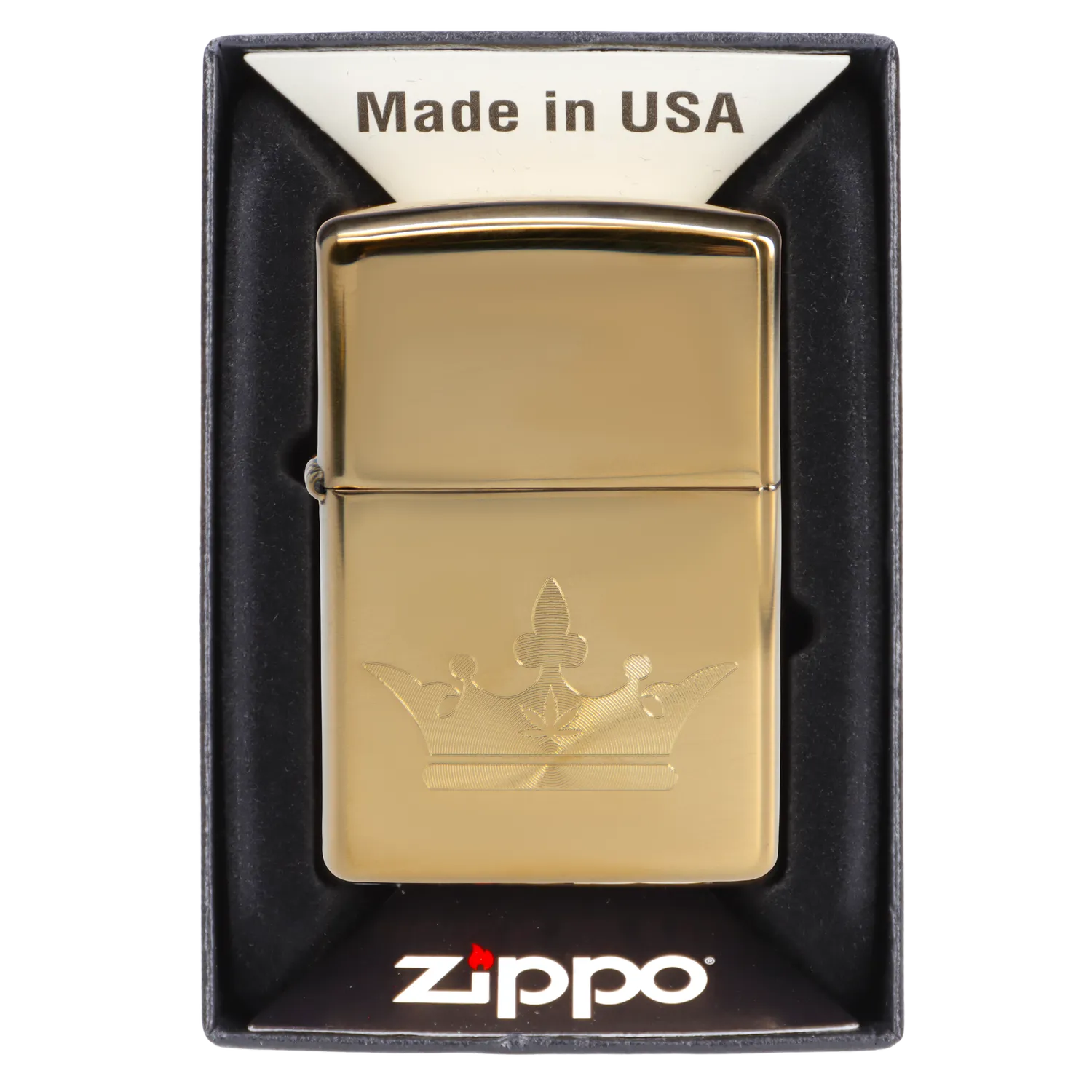 Gold Zippo lighter engraved with a cannabis leaf design in its packaging.