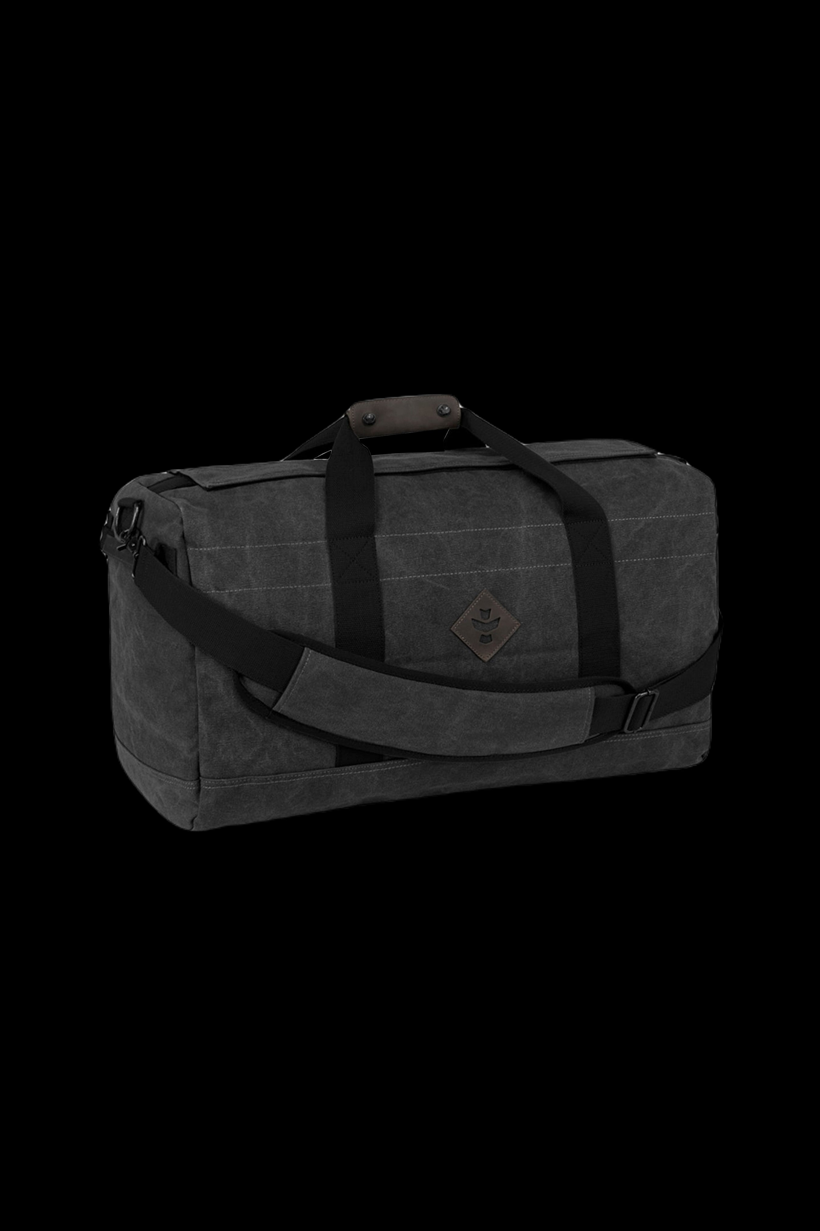 Black waxed canvas duffel bag with leather straps, designed for discreet cannabis accessory storage.