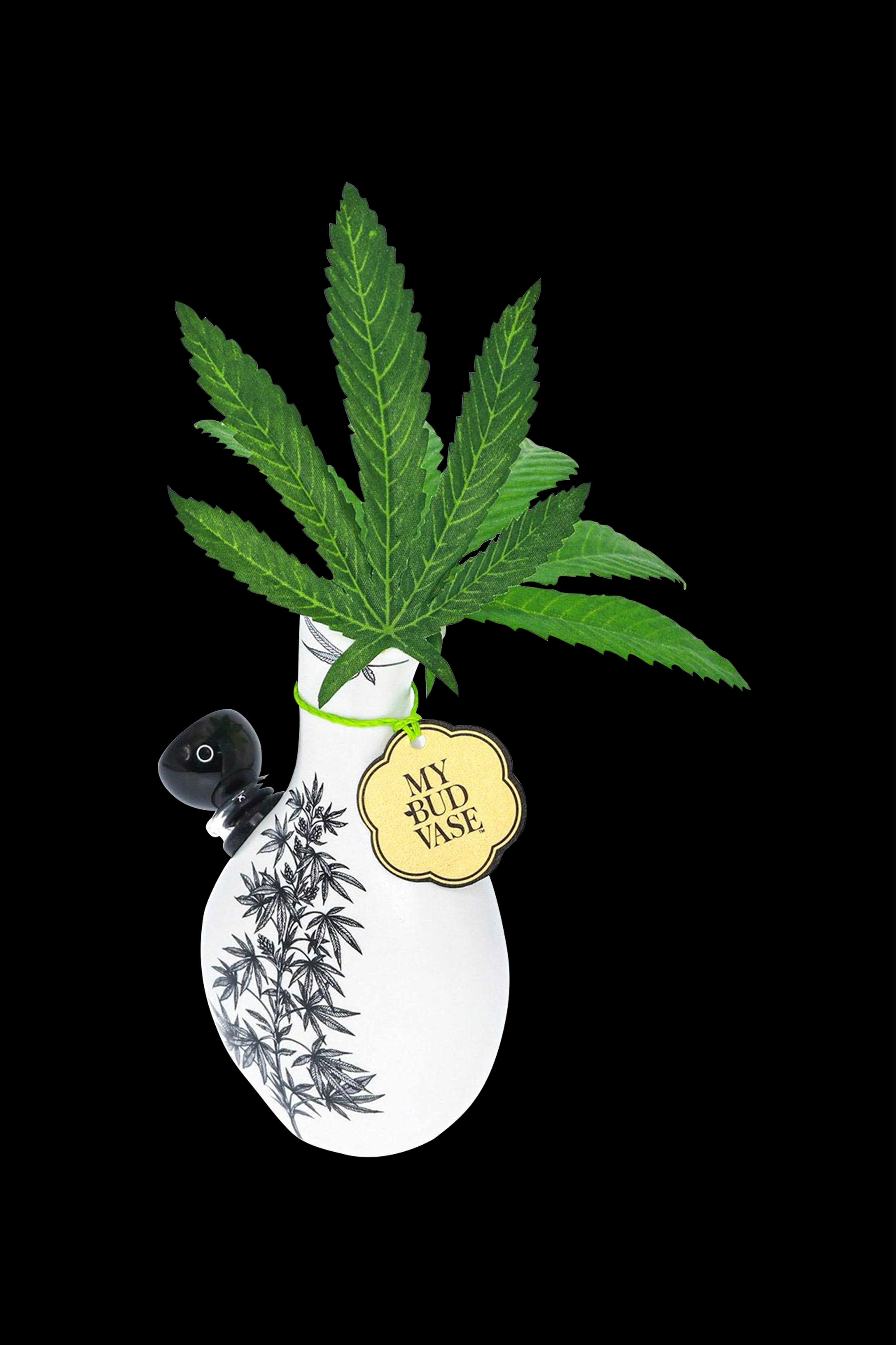 A white ceramic vase shaped like a cannabis bud with a vibrant green cannabis plant growing from the top, tagged with a circular label reading "My Bud Vase."