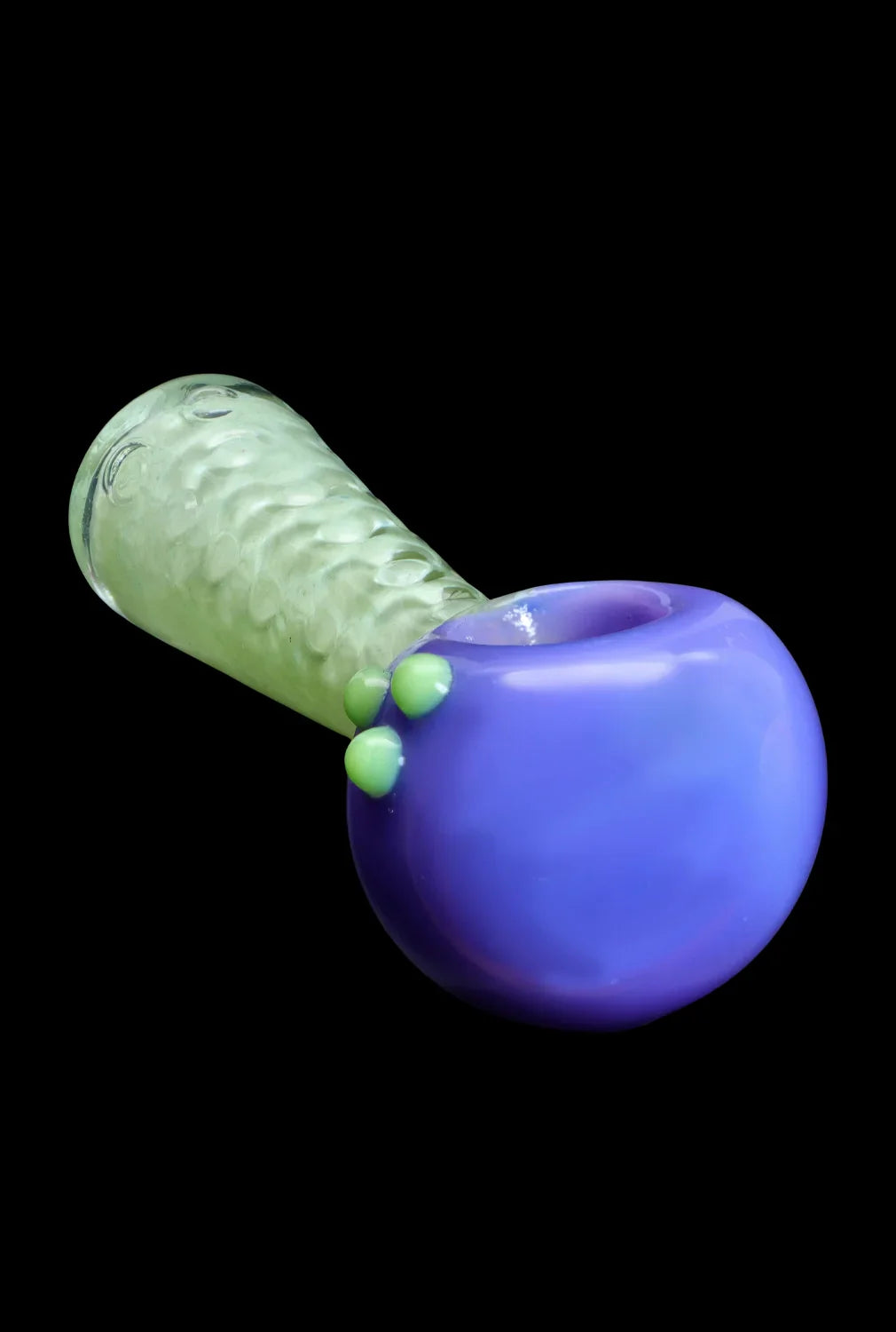 Blue and green glass cannabis pipe against a black background.