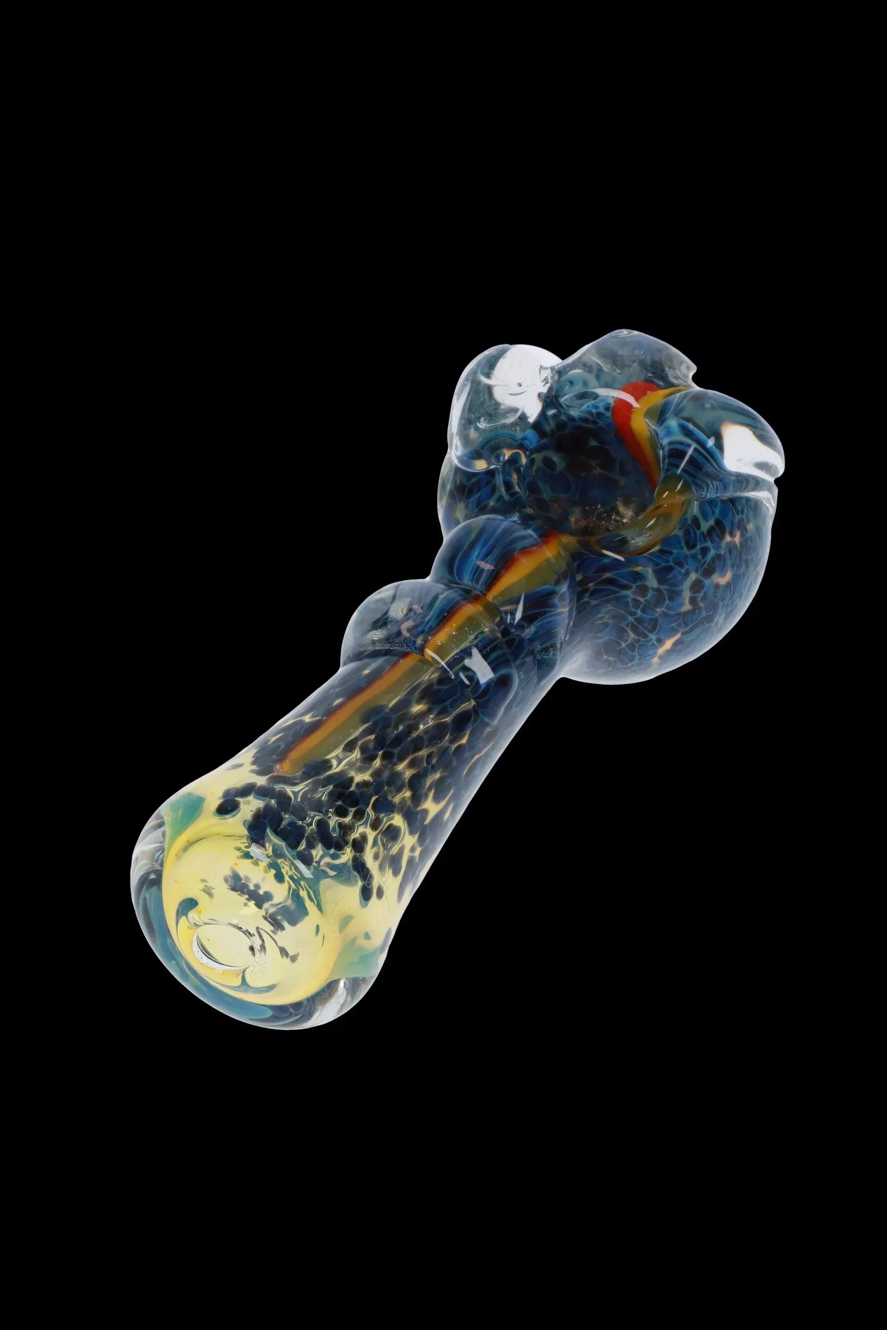 Glass pipe with blue and yellow swirls, isolated on a black background.