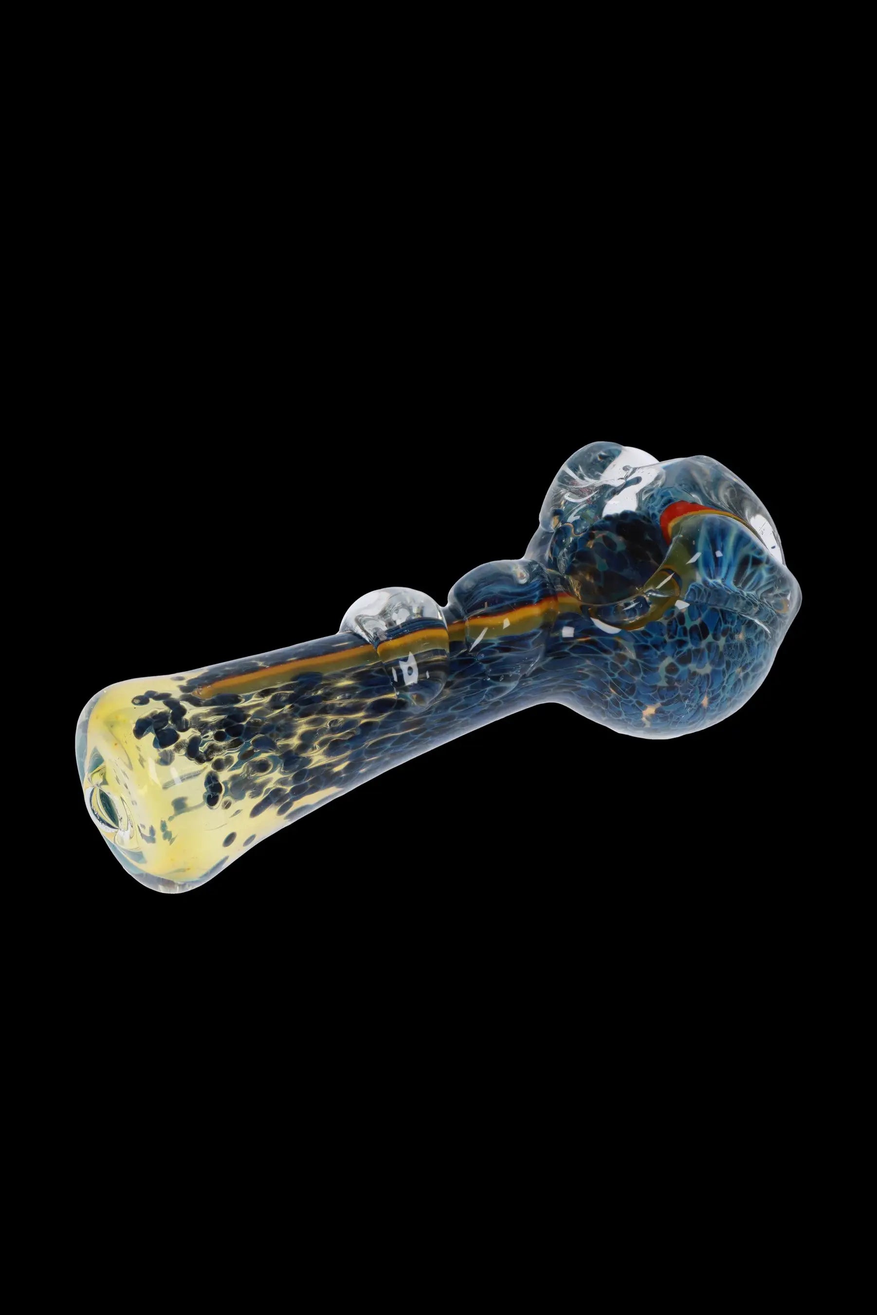 Hand pipe with blue and yellow glass swirl pattern.