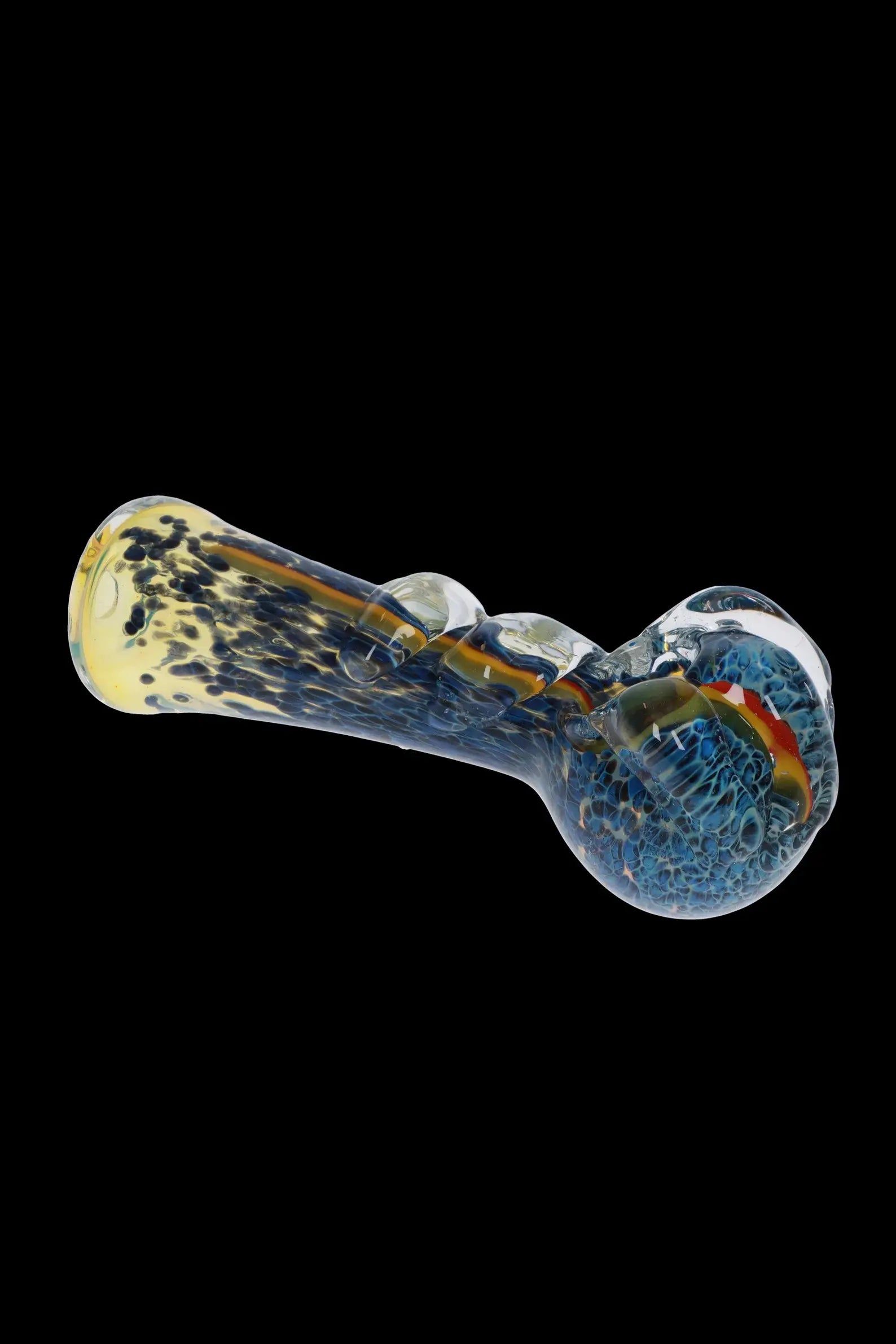 Blue and yellow glass pipe isolated on a black background.